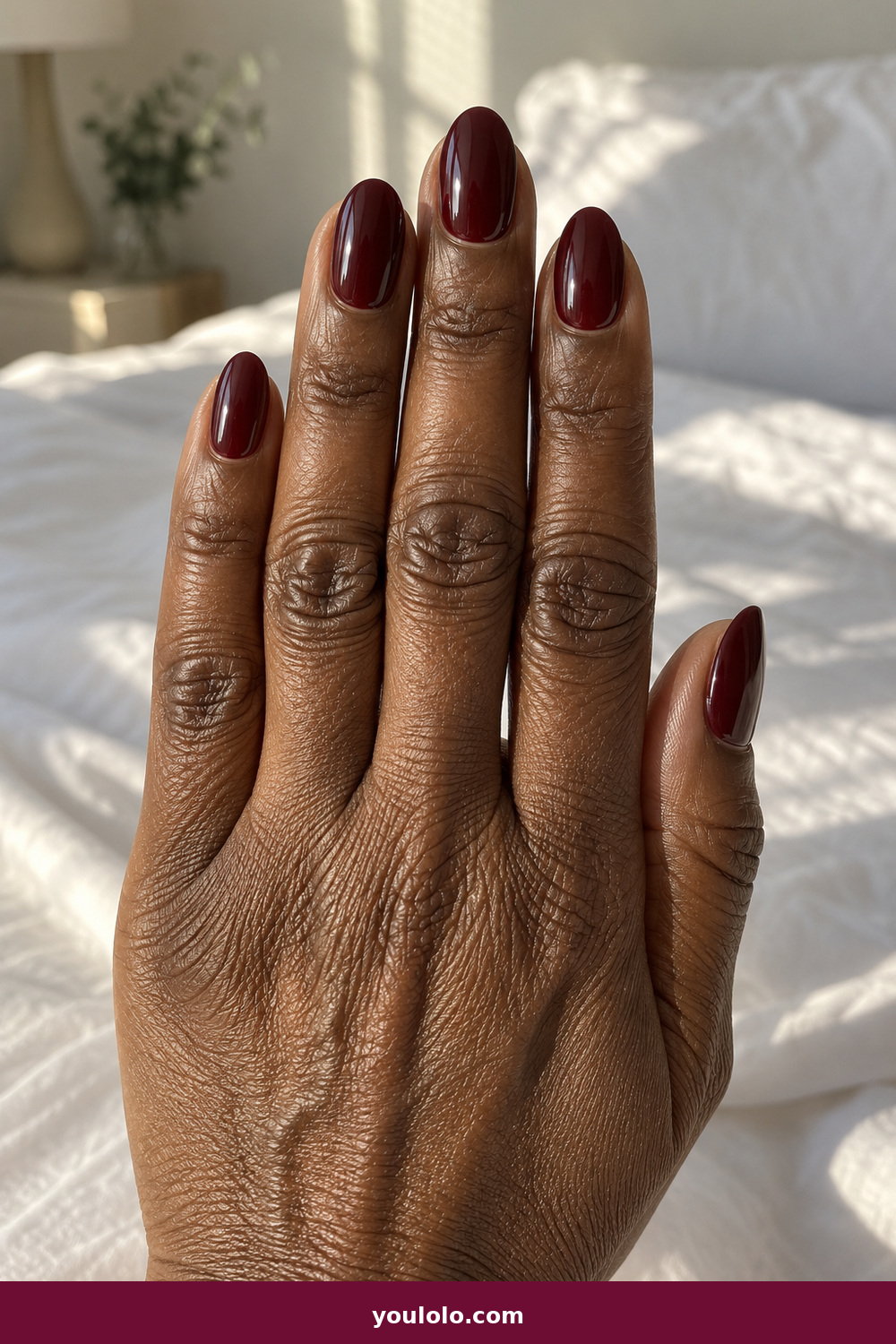 Gel Nails Ideas idea 1: Black Cherry Glass, medium oval translucent black-cherry jelly gel with high shine