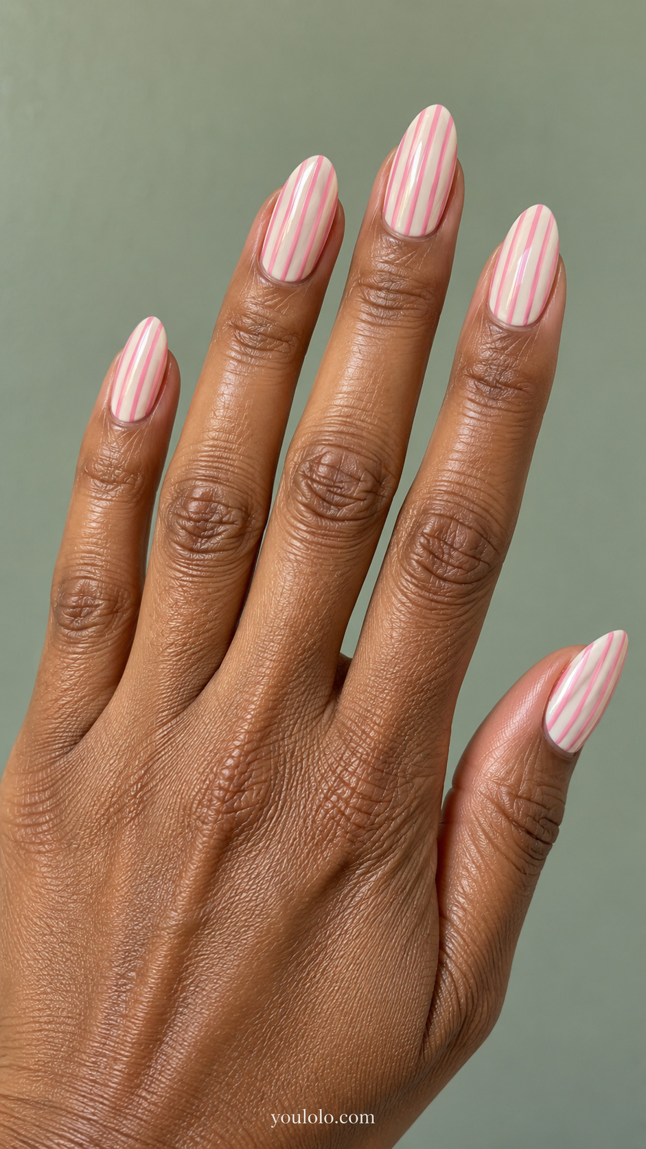 Pink striped nails — blush and cream vertical pinstripes