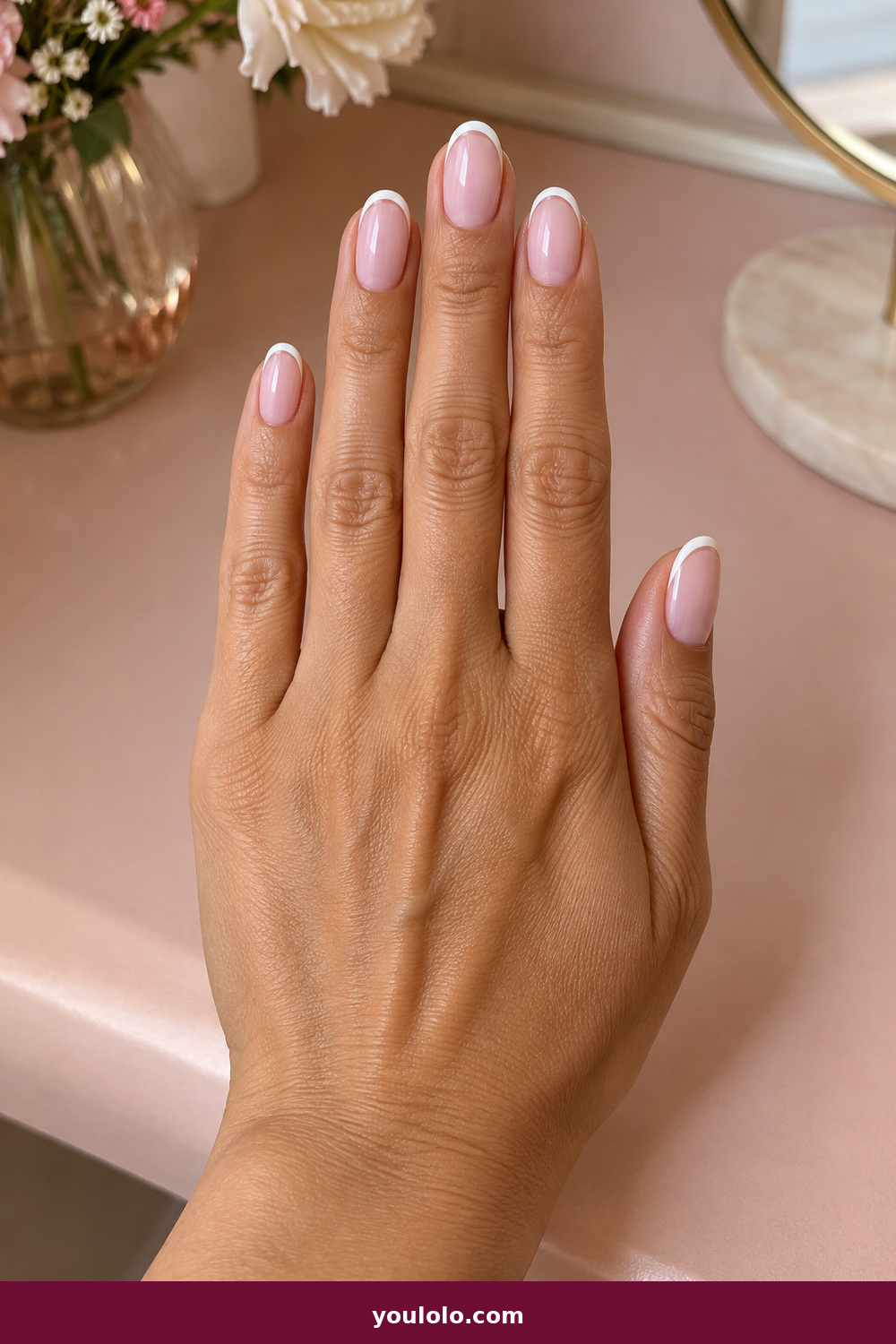 Pink and White Nails idea 1: Blush Floating French, medium oval blush nails with detached floating white French arcs