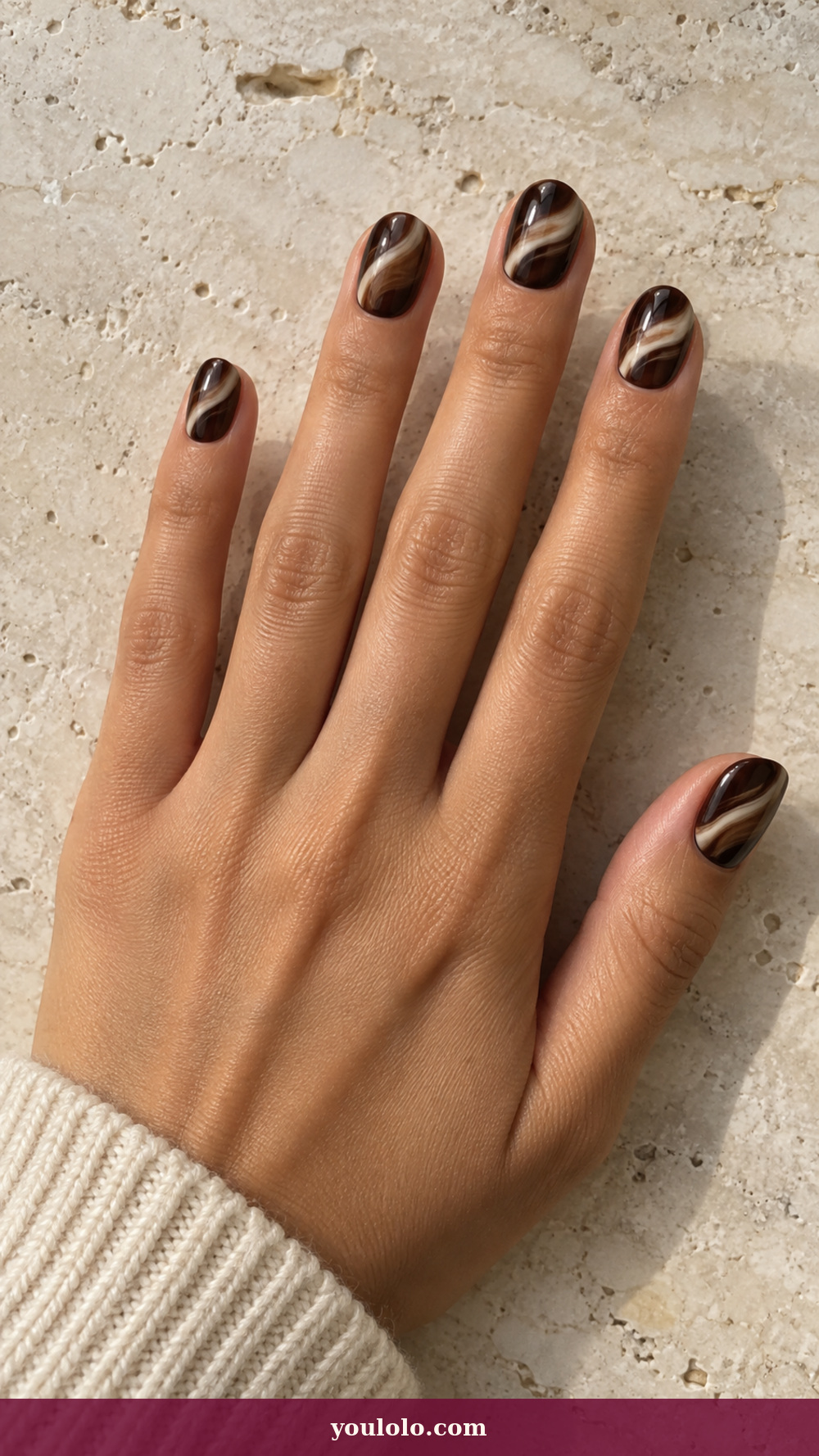 Italy Nails idea 1: Espresso Crema Swirl on a realistic feminine hand