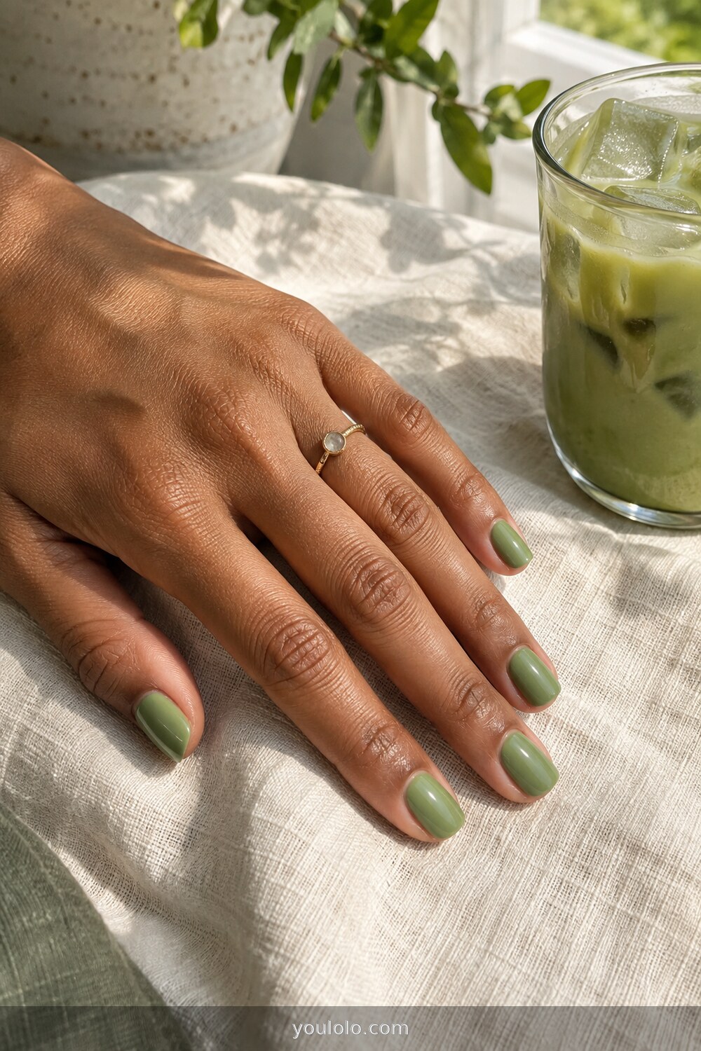 Milky matcha Early Fall Nails on a realistic hand