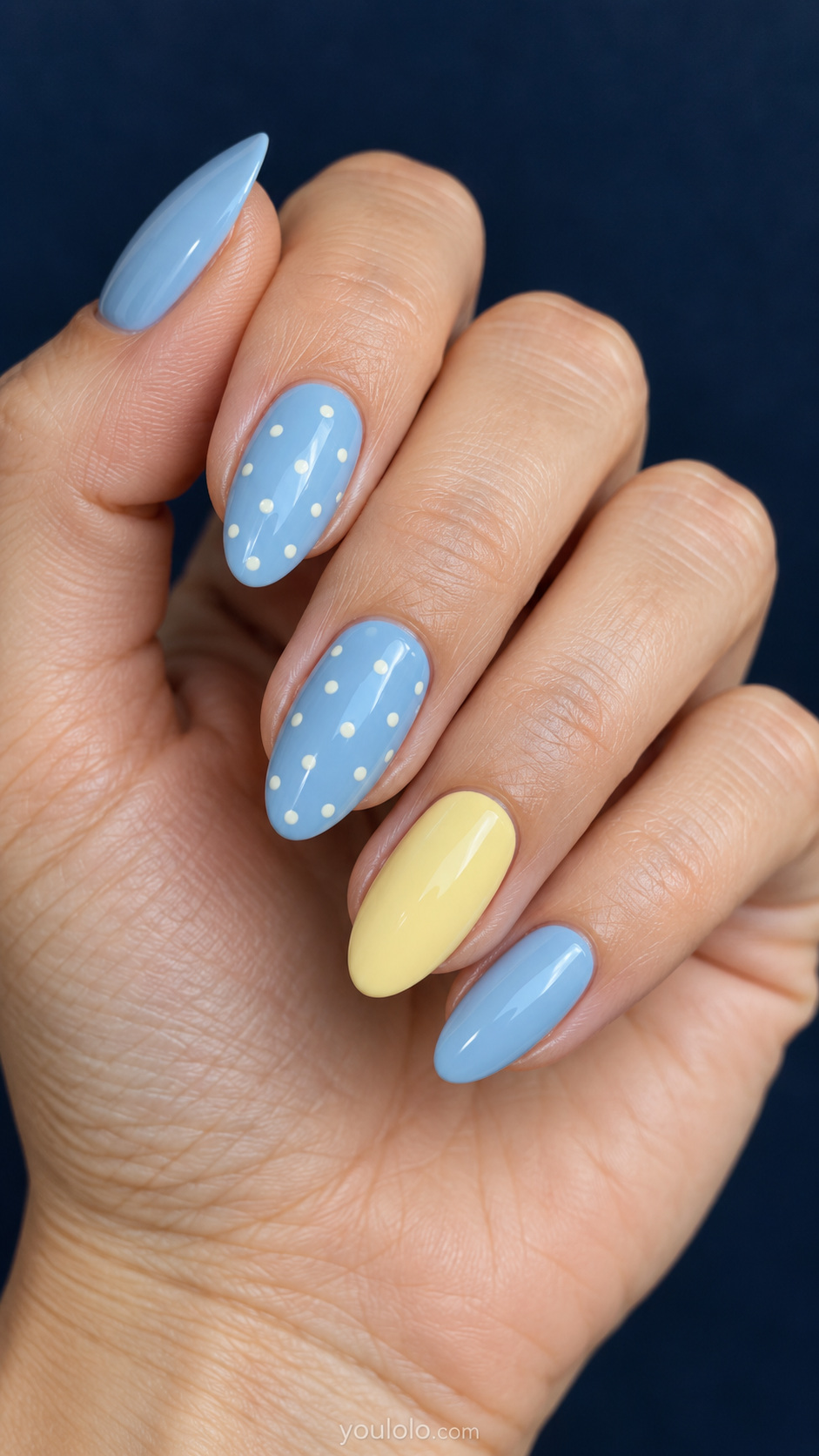 Butter yellow nails — powder blue with tiny ivory dots