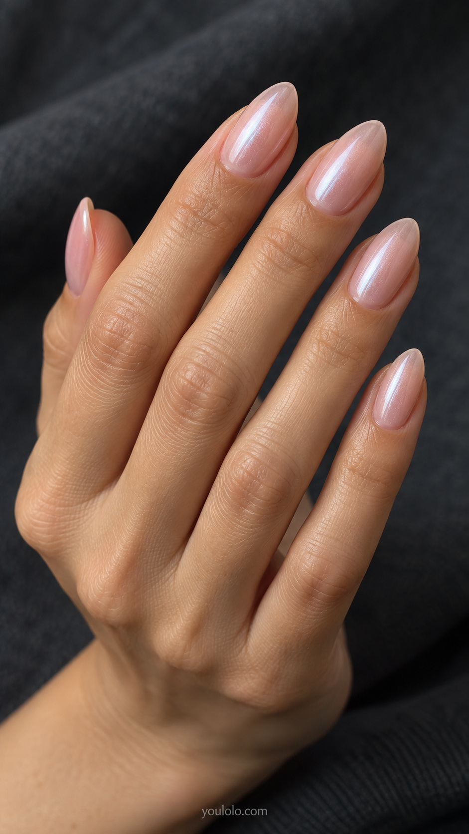 Glazed pink almond nails — sheer blush with a pearl veil