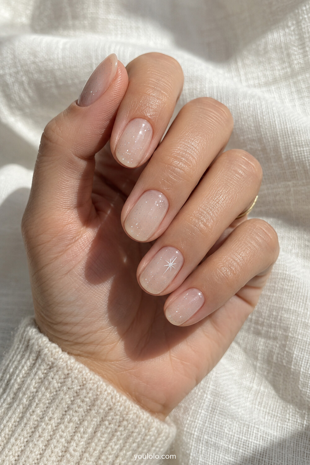 Galaxy Nails with a sheer milky nude base and subtle silver stardust