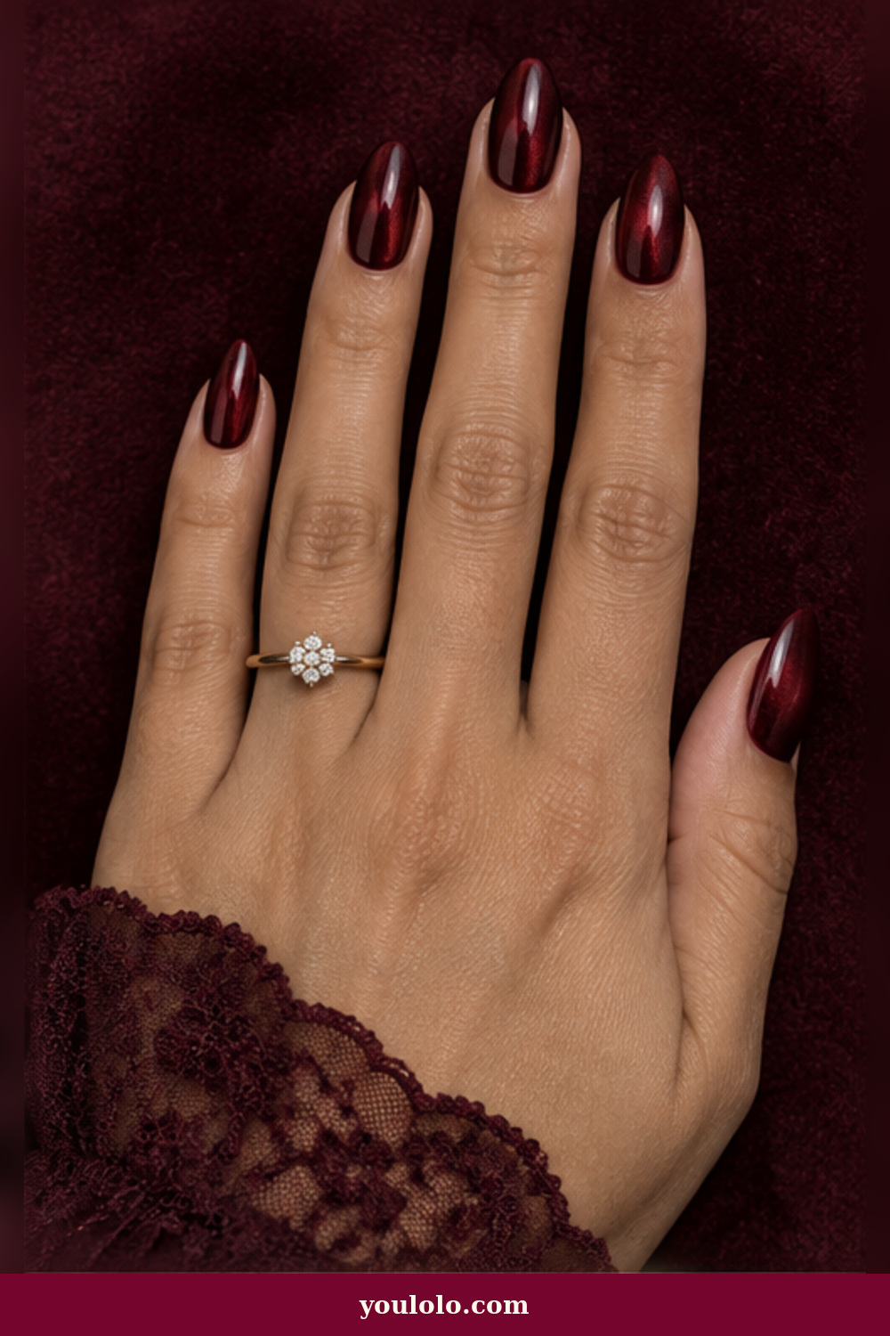 Emo Nails idea 2: medium almond black-cherry nails with a deep ruby chrome glow