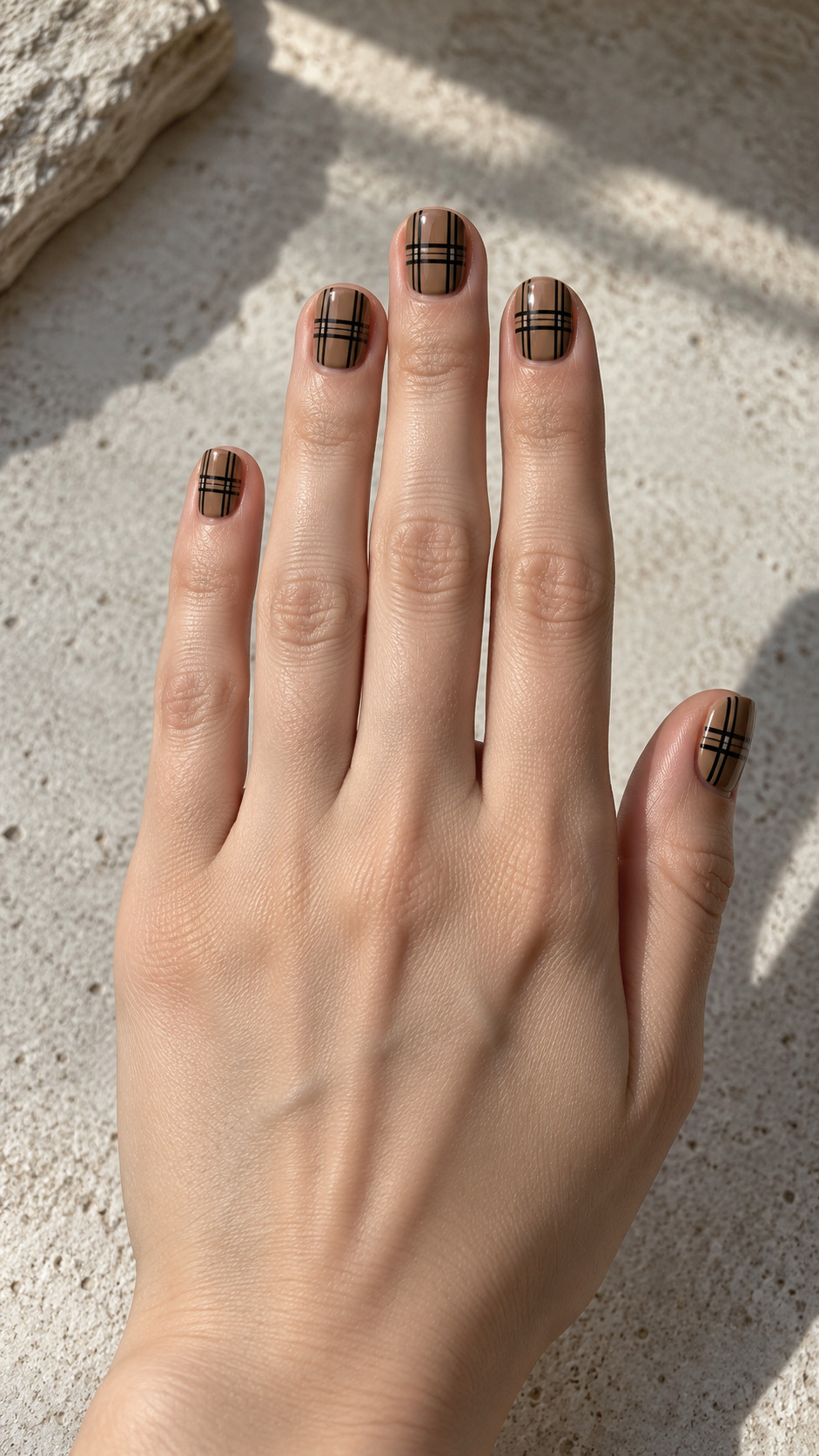 Plaid Nails idea 2: Camel Windowpane manicure on a realistic feminine hand