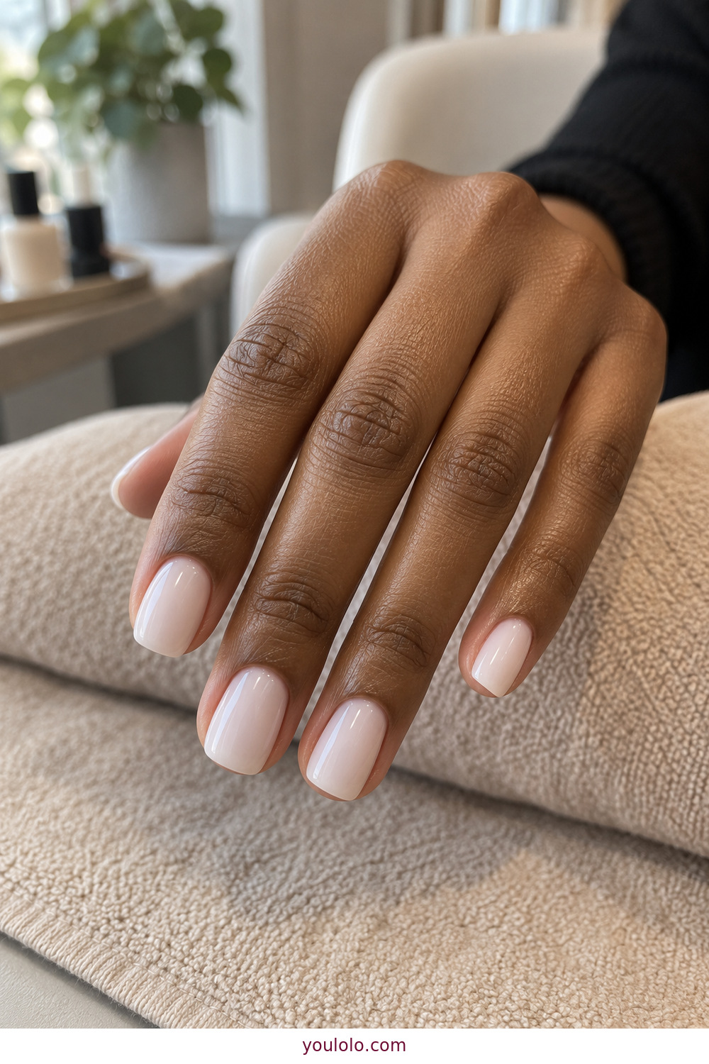 Creamy milky white polish on short soft square nails