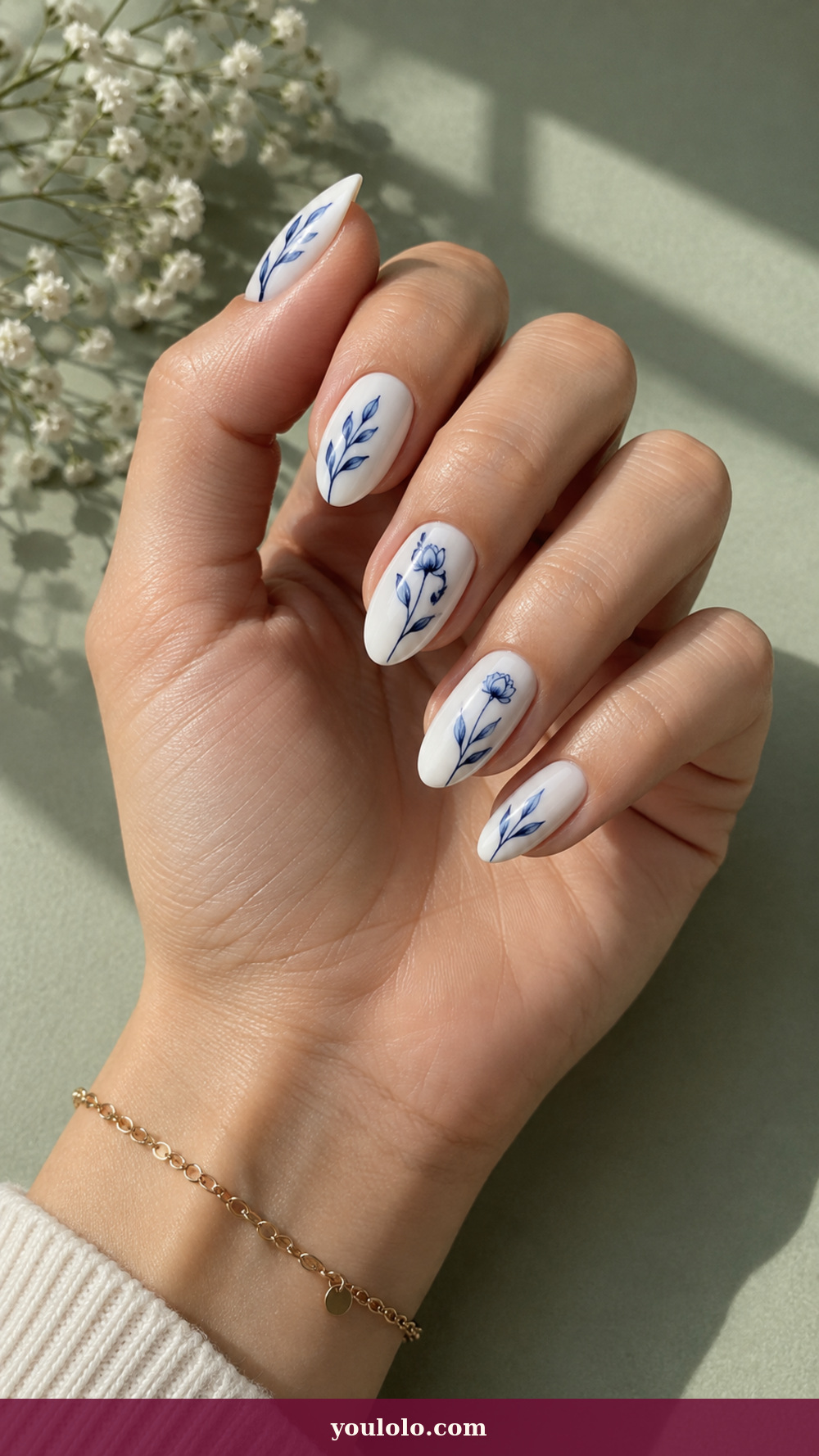 Blue and White Nails idea 2: Delft Botanical Miniatures on a realistic feminine hand