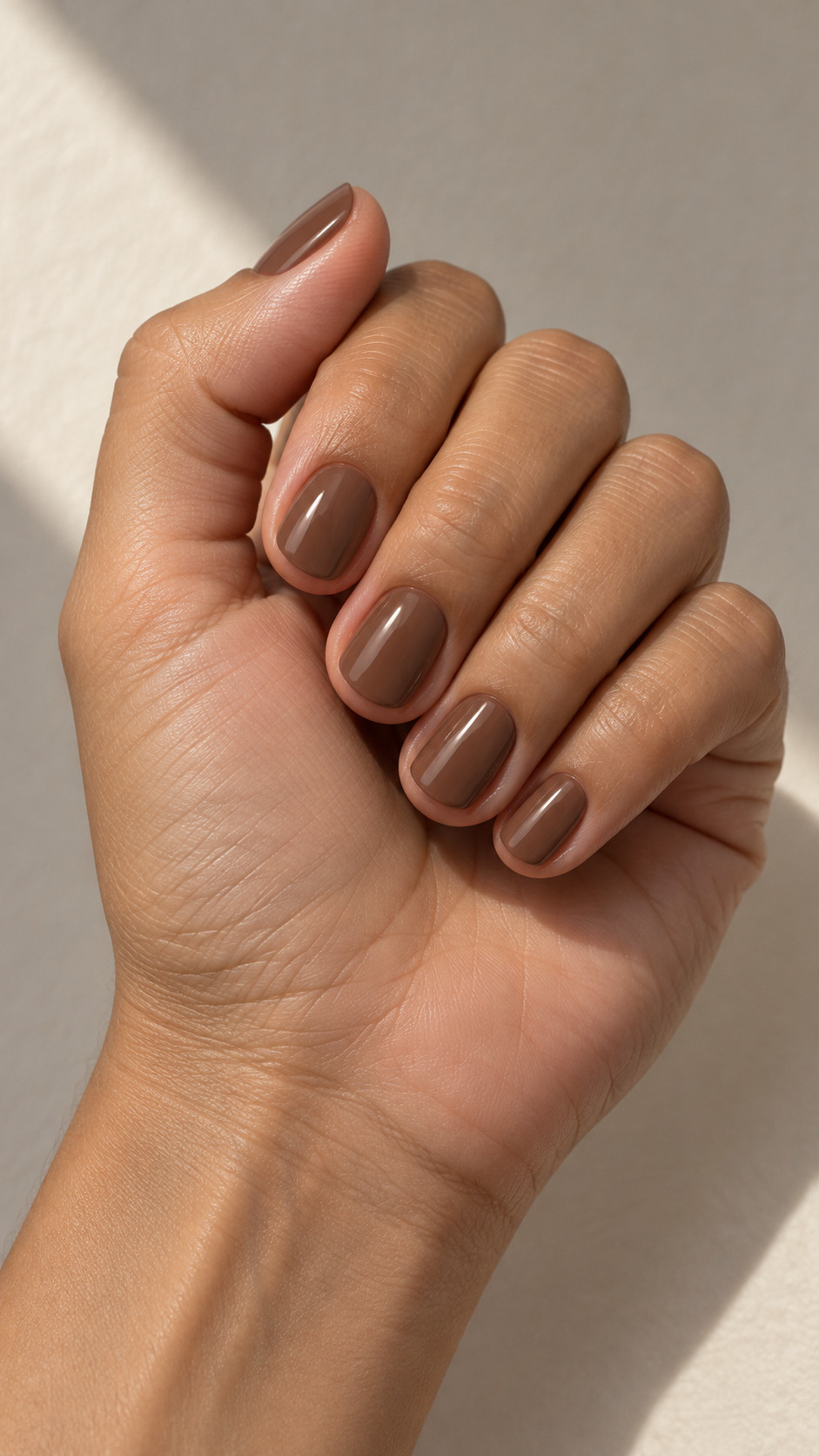 Chocolate Brown Nails idea 2: Milk Chocolate manicure on a realistic feminine hand
