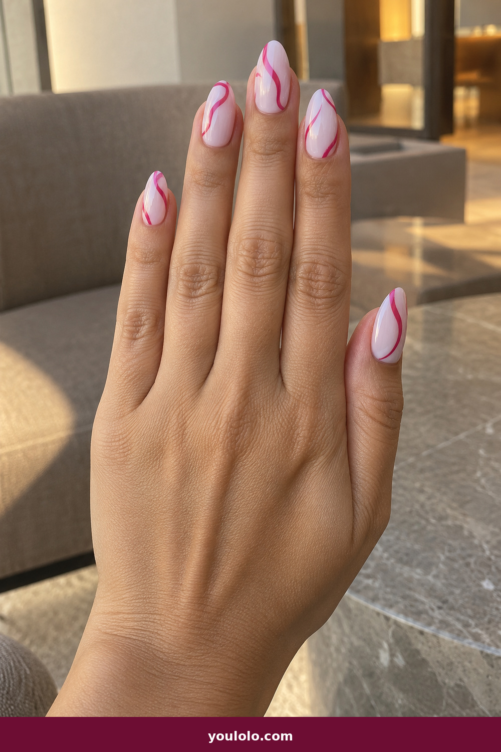 Pink and White Nails idea 2: Raspberry Milk Swirl, medium almond milky white nails with raspberry-pink ribbon swirls