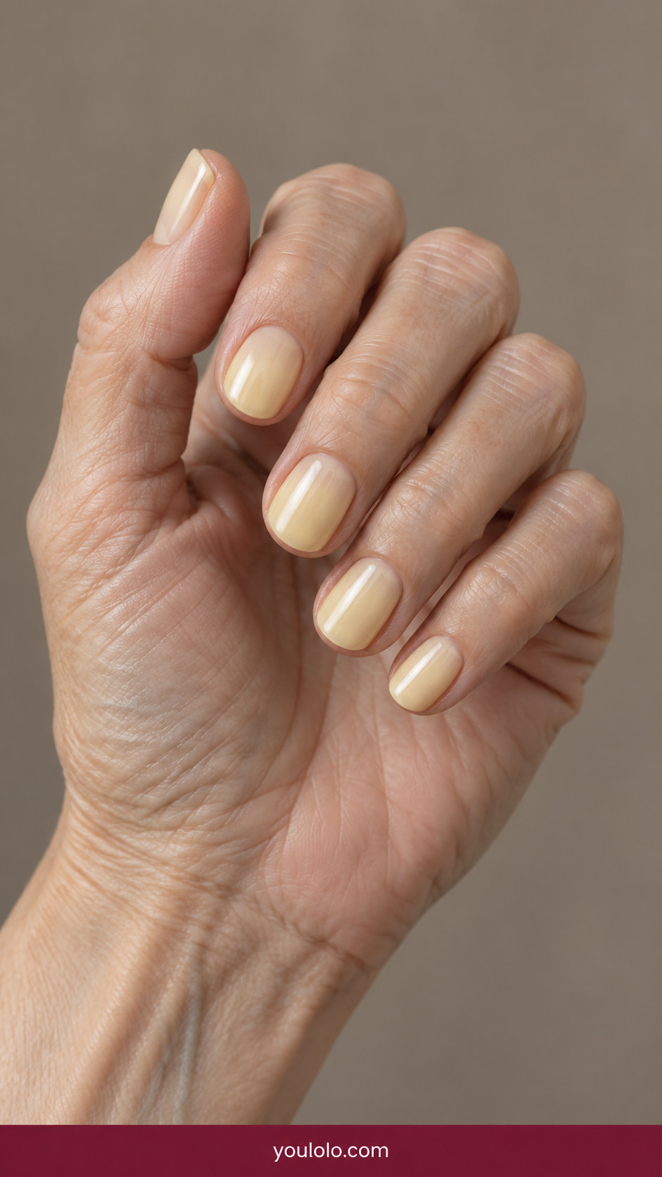 Butter Yellow Nails idea 2: sheer milky butter-yellow wash on short natural nails on an anatomically realistic feminine hand
