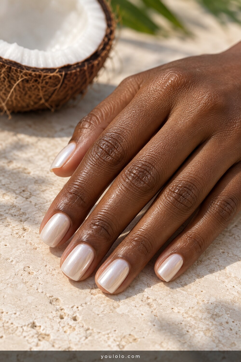 Creamy coconut chrome on realistic soft square nails