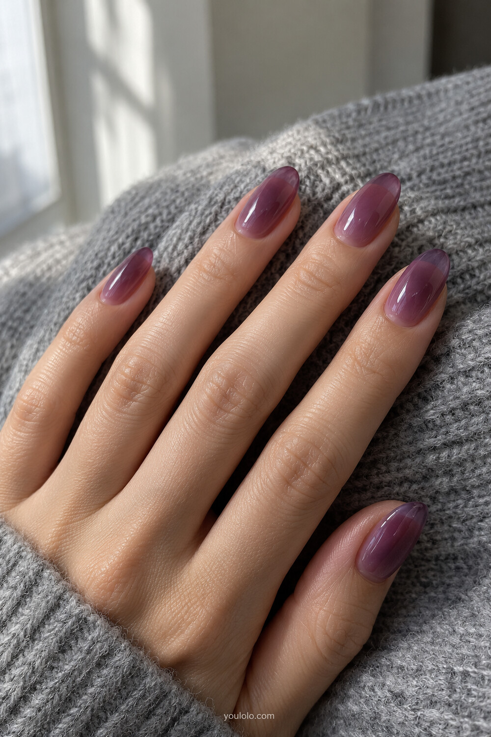 Translucent grape purple jelly manicure on almond nails
