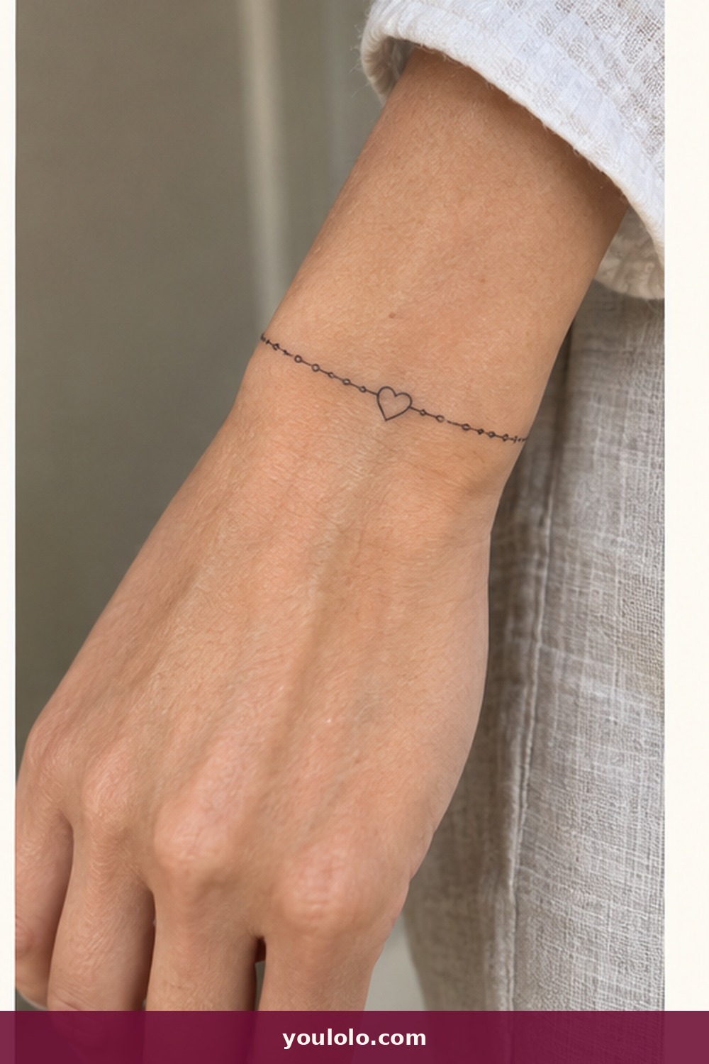 Permanent Bracelet With a Heart Charm — idea 3 from Dainty Wrist Tattoos for Women