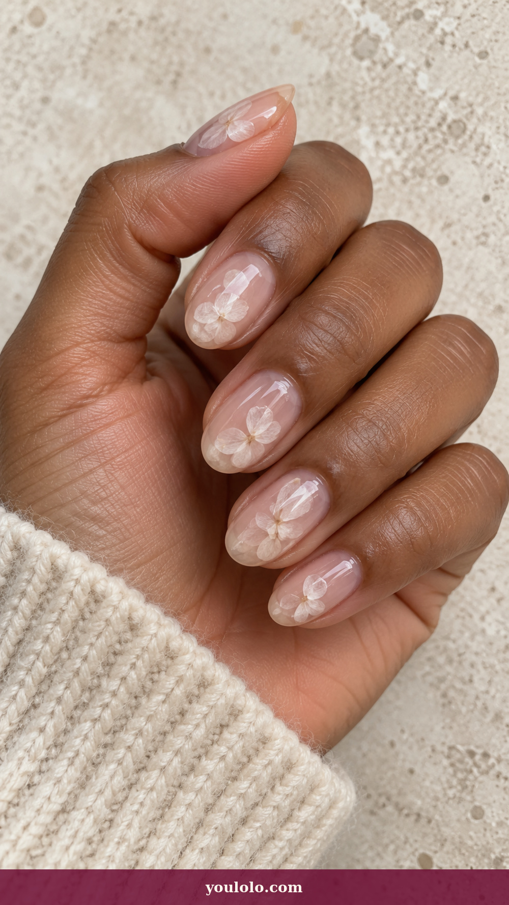 Douyin Nails idea 3: Pressed Camellia Glass on a realistic feminine hand
