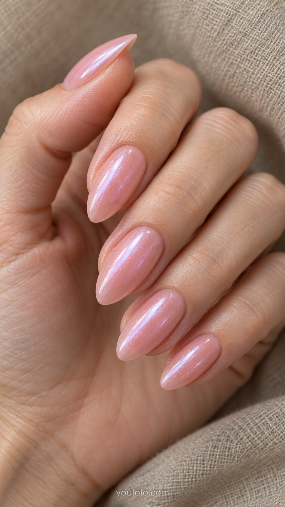 Glazed pink almond nails — rosewater pink with a cool reflection