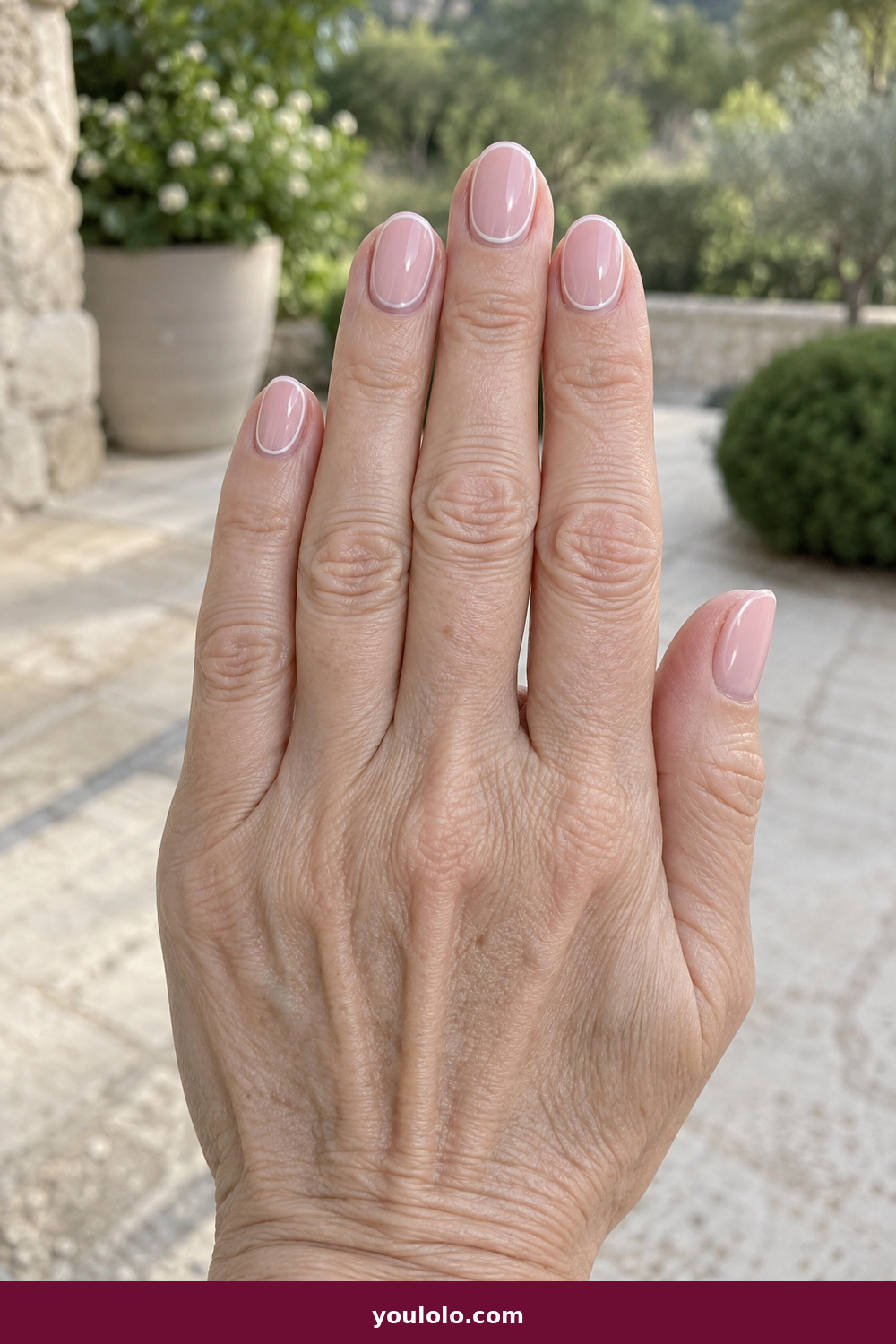 Pink and White Nails idea 3: White Frame Pink, short oval pink nails with a thin white frame around each nail