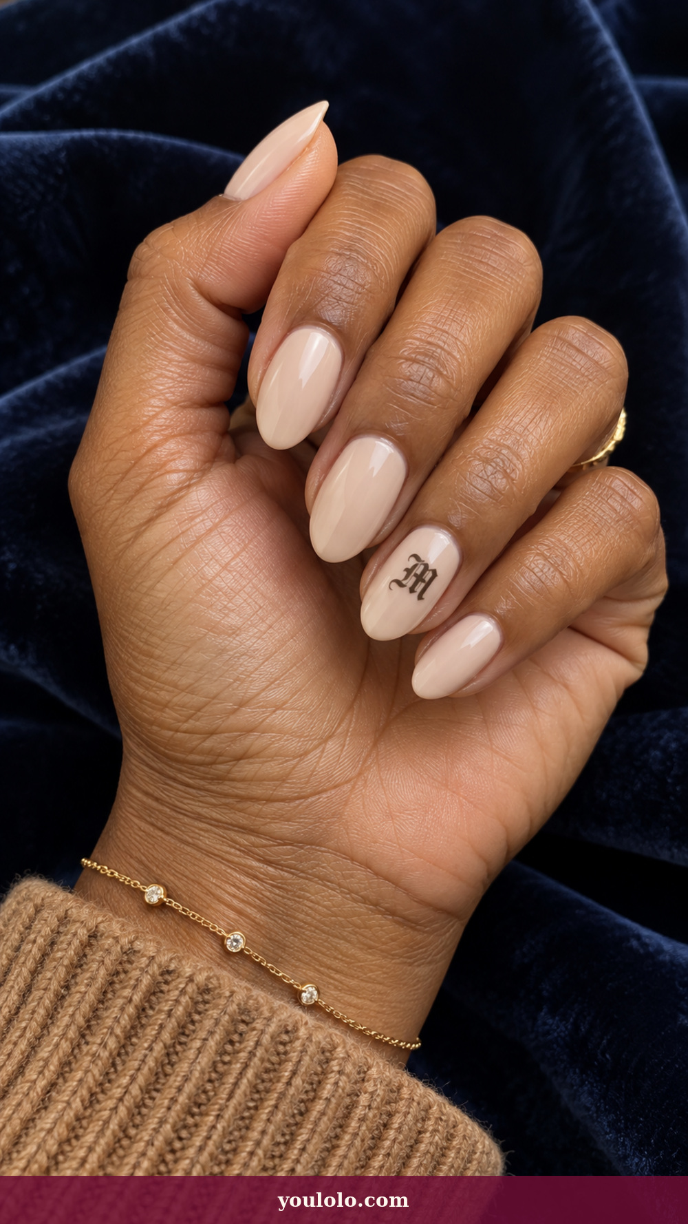 Initial Nails idea 4: Blackletter Accent on a realistic feminine hand