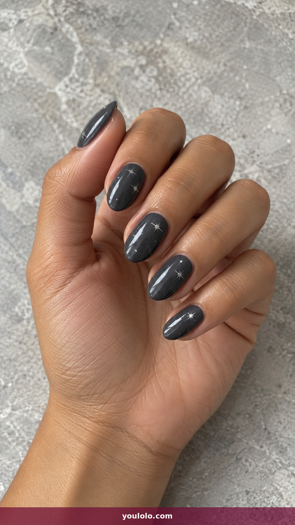 Sparkly Nails idea 4: Charcoal Star Scatter in a realistic fall manicure