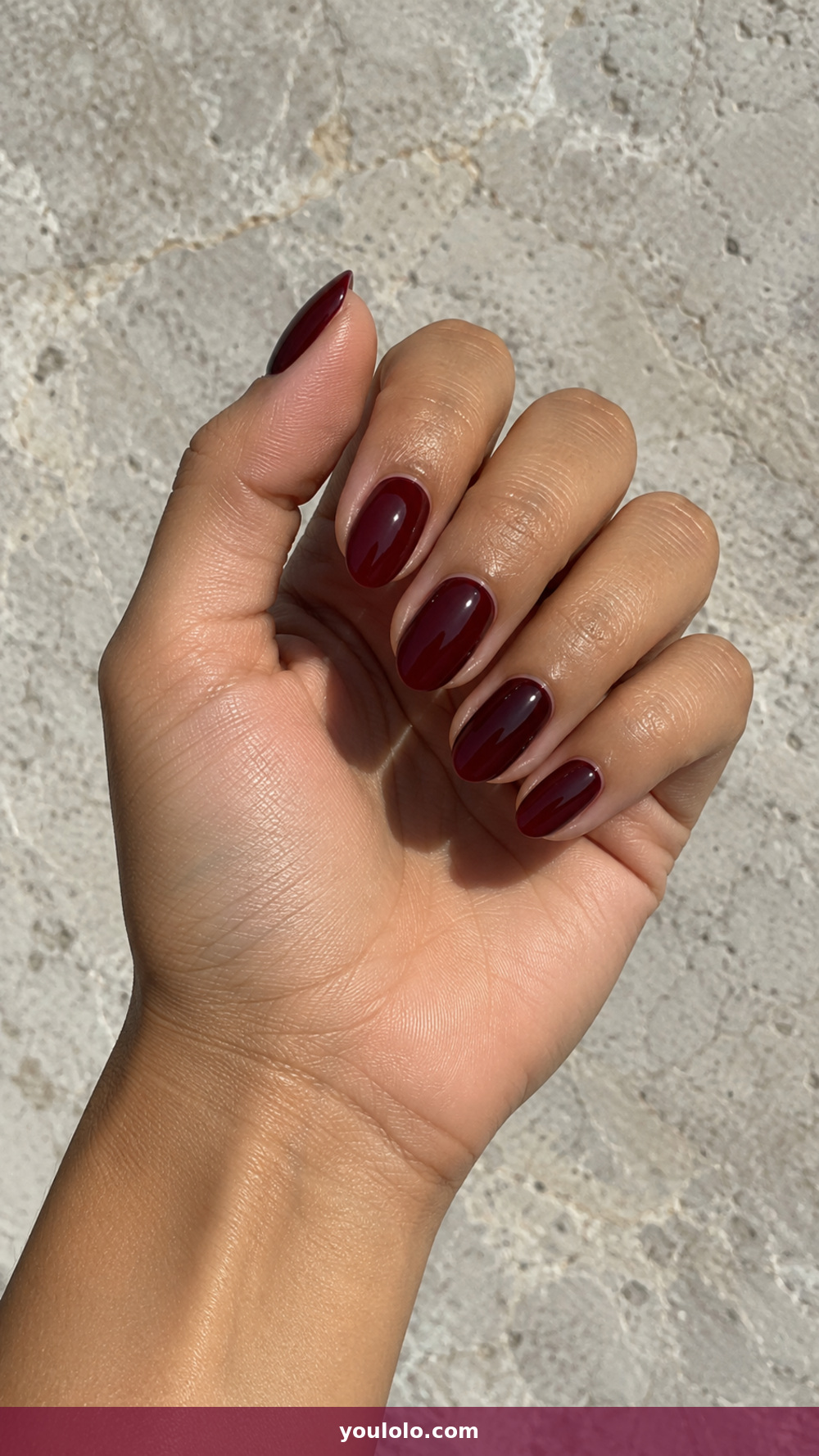 BIAB Nails Inspiration idea 4: Dark Cherry Almond Overlay in a realistic fall manicure