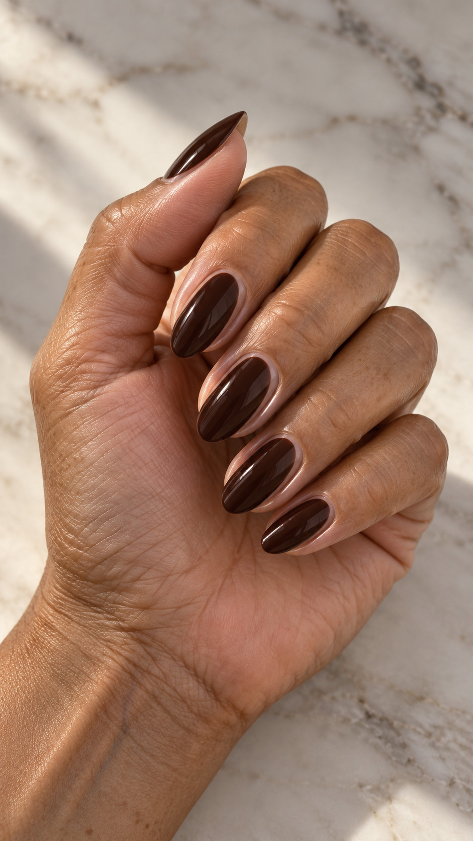 Italian Manicure idea 4: Espresso Precision manicure on a realistic feminine hand