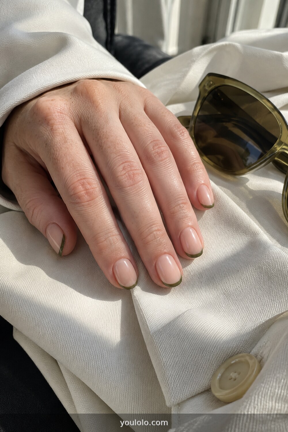 Olive micro French tips for a subtle September manicure