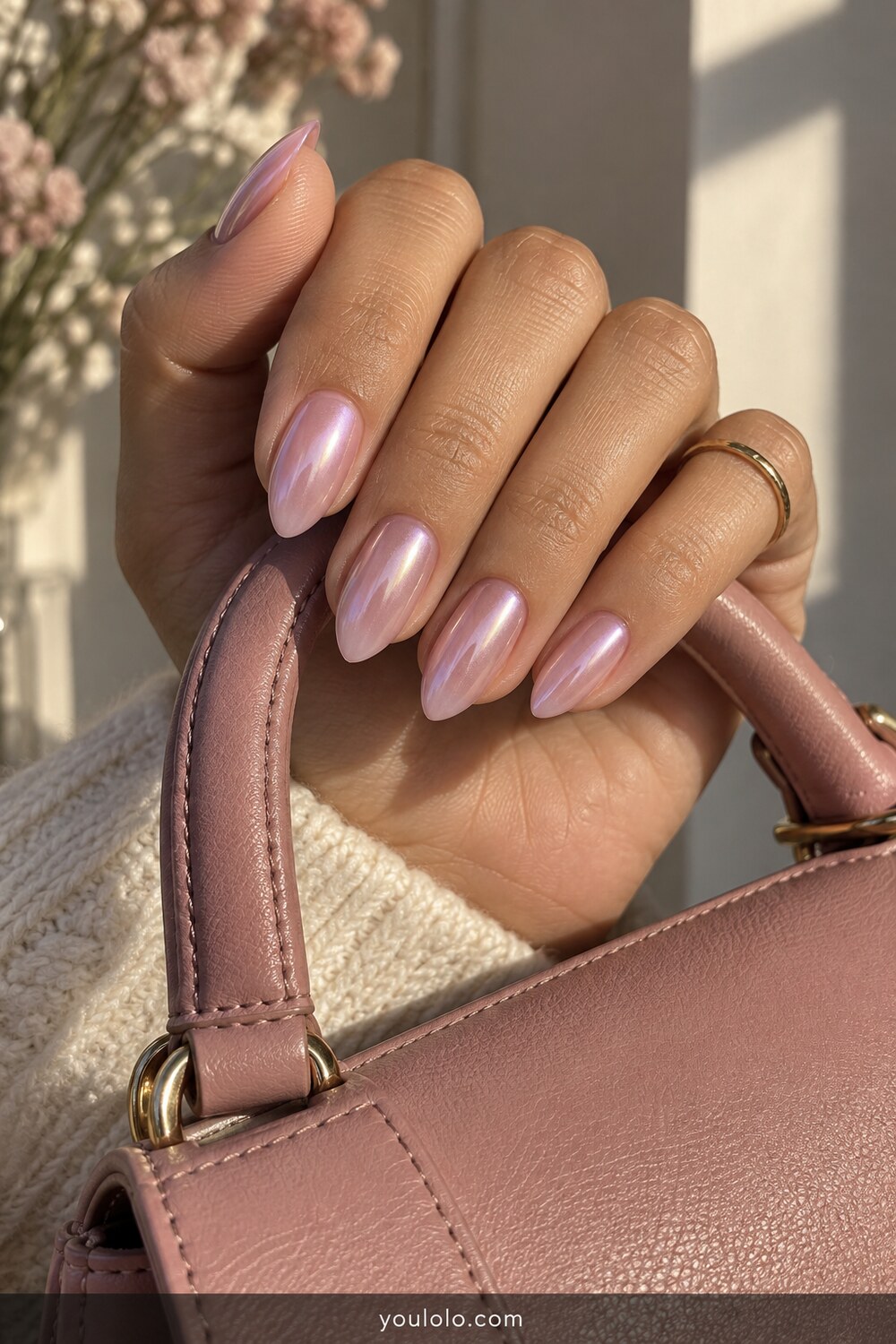 Pink lilac glazed chrome on medium almond nails