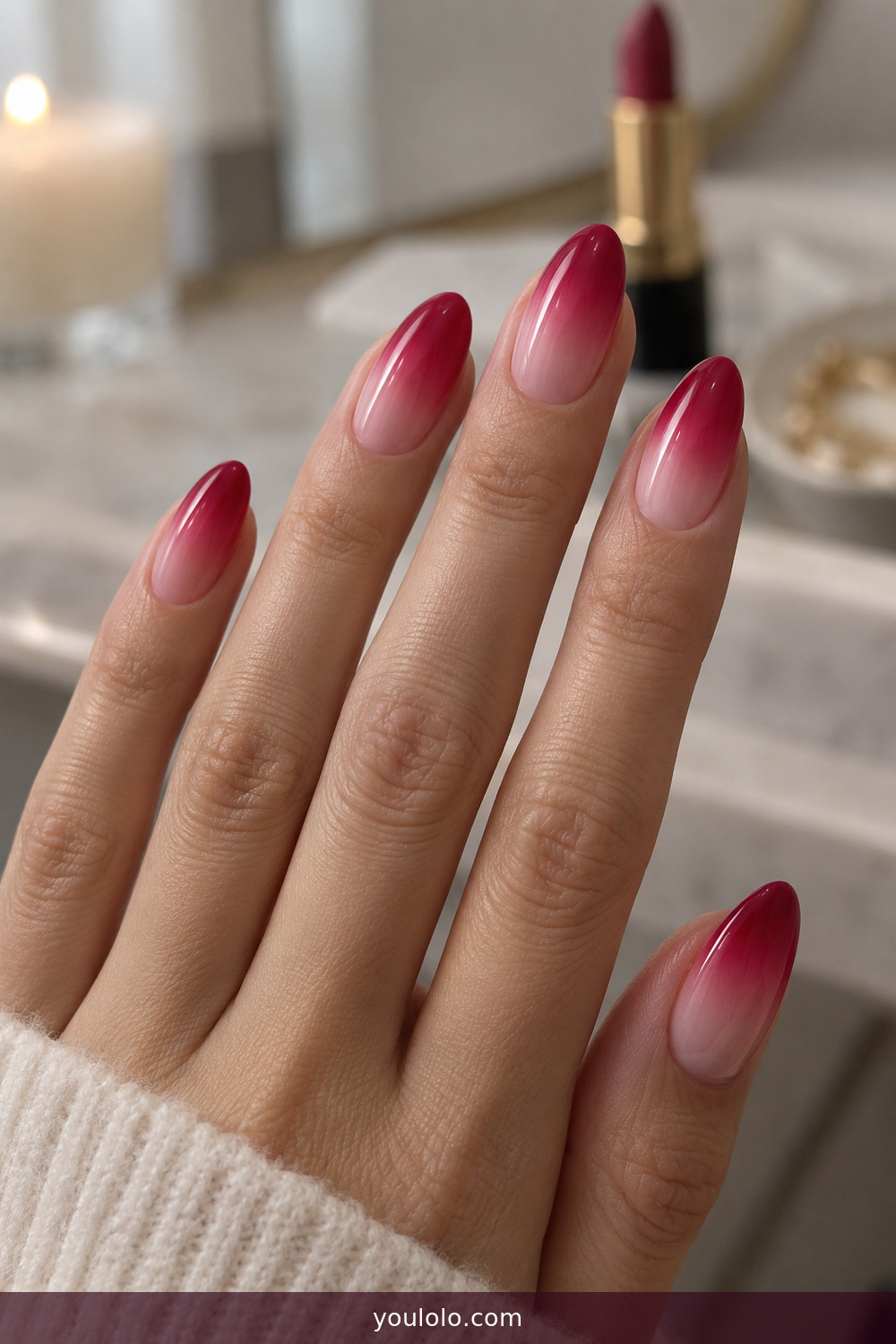 Raspberry syrup ombre on glossy almond nails