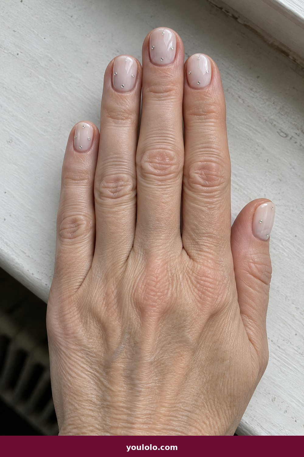 Gel Nails Ideas idea 4: Silver Dew, milky short nails with scattered tiny silver dew-drop gel accents
