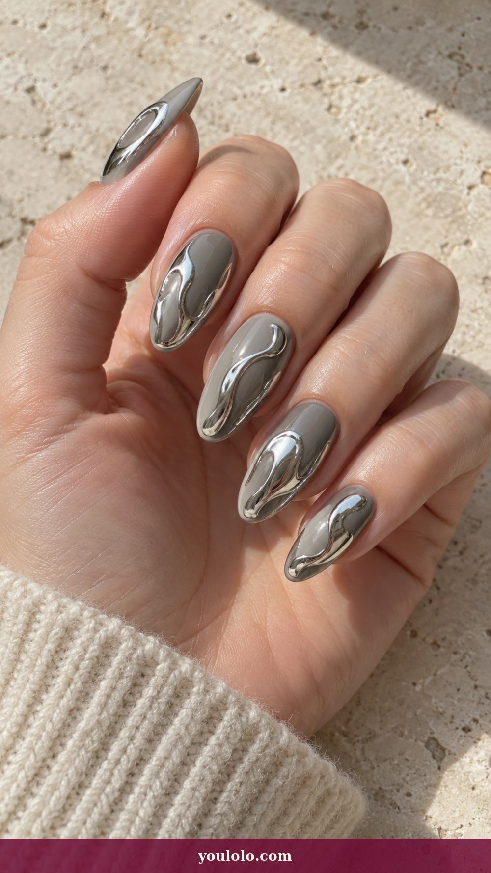 Acrylic Nails Ideas idea 4: Silver Liquid Puddles on a realistic feminine hand