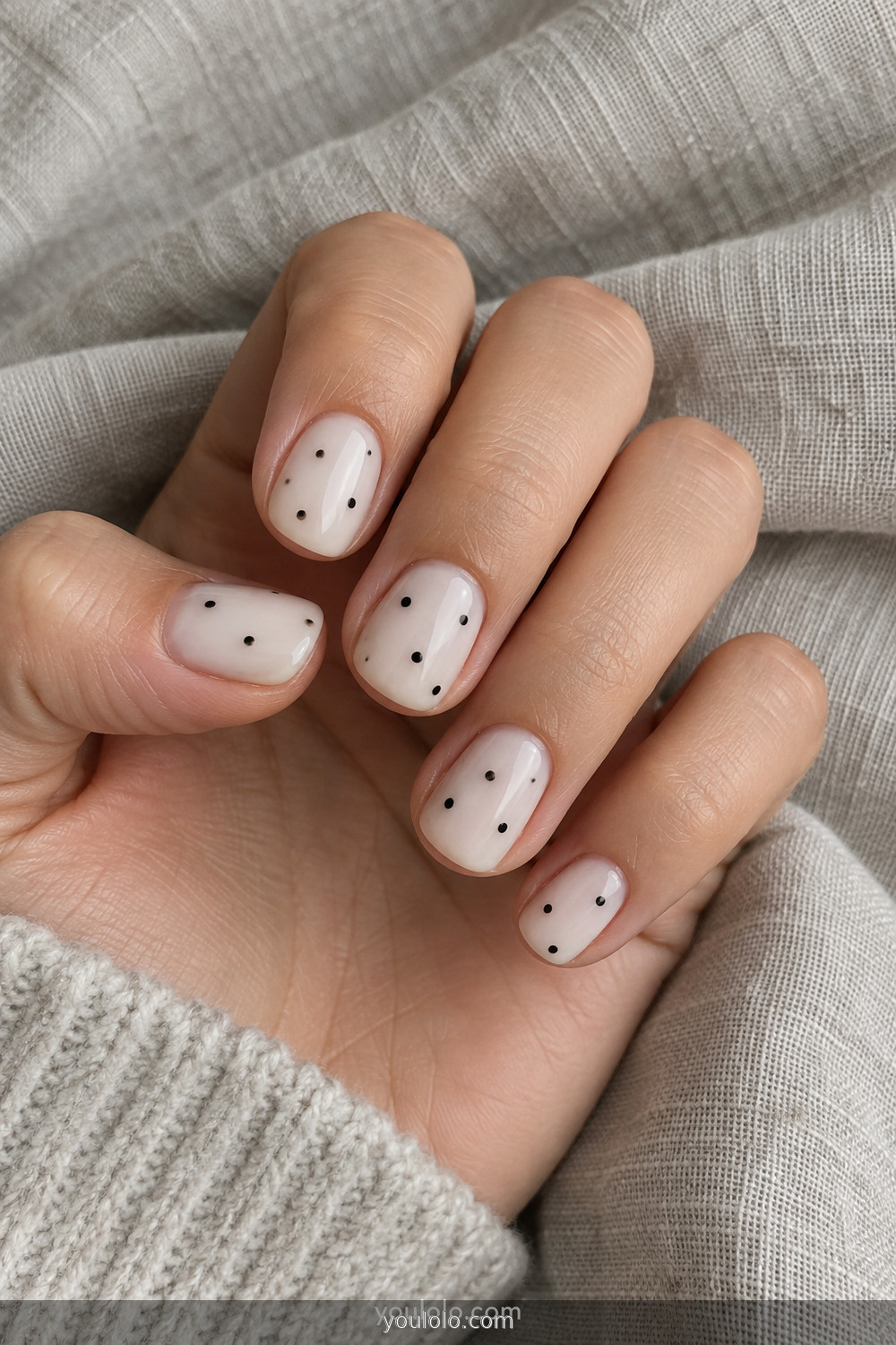 Milky white Easy Halloween Nails with simple black toothpick dots