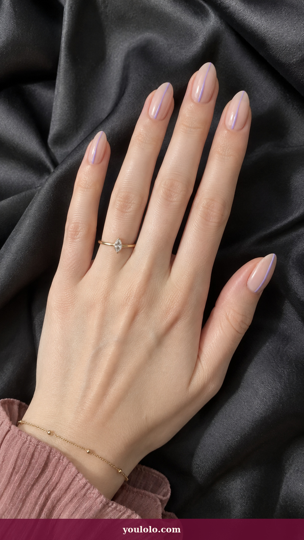Simple Spring Nails idea 5: Lilac Color Seam on a realistic feminine hand