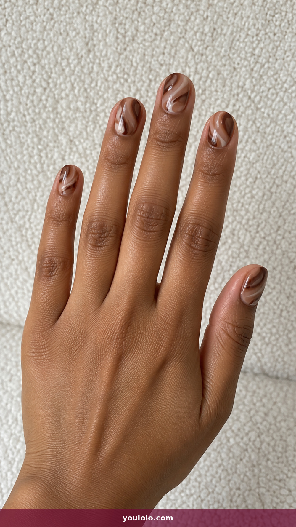Short Oval Nails idea 5: Pecan Latte Swirls in a realistic fall manicure