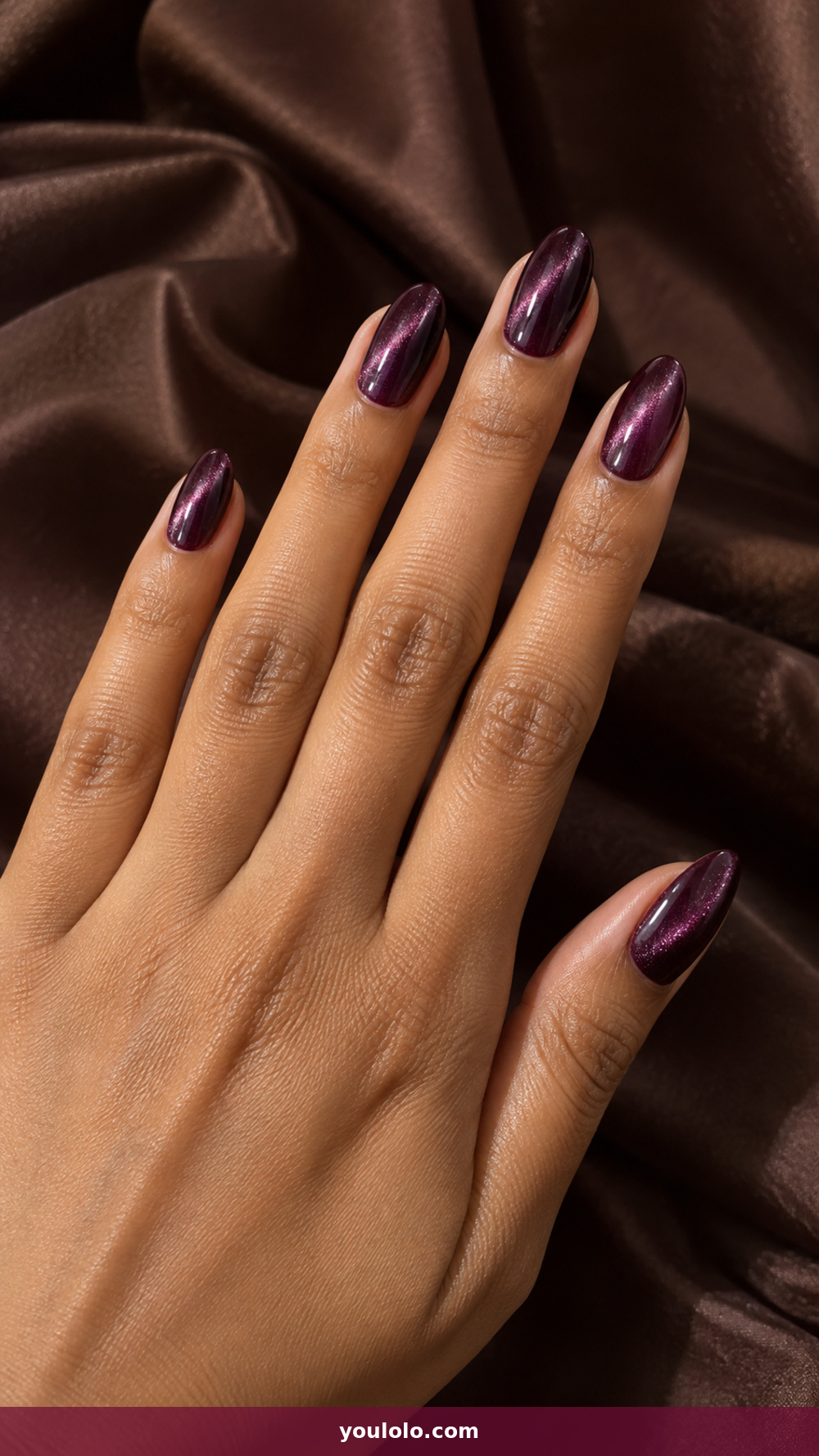 Sparkly Nails idea 5: Plum Gemstone Cat-Eye in a realistic fall manicure
