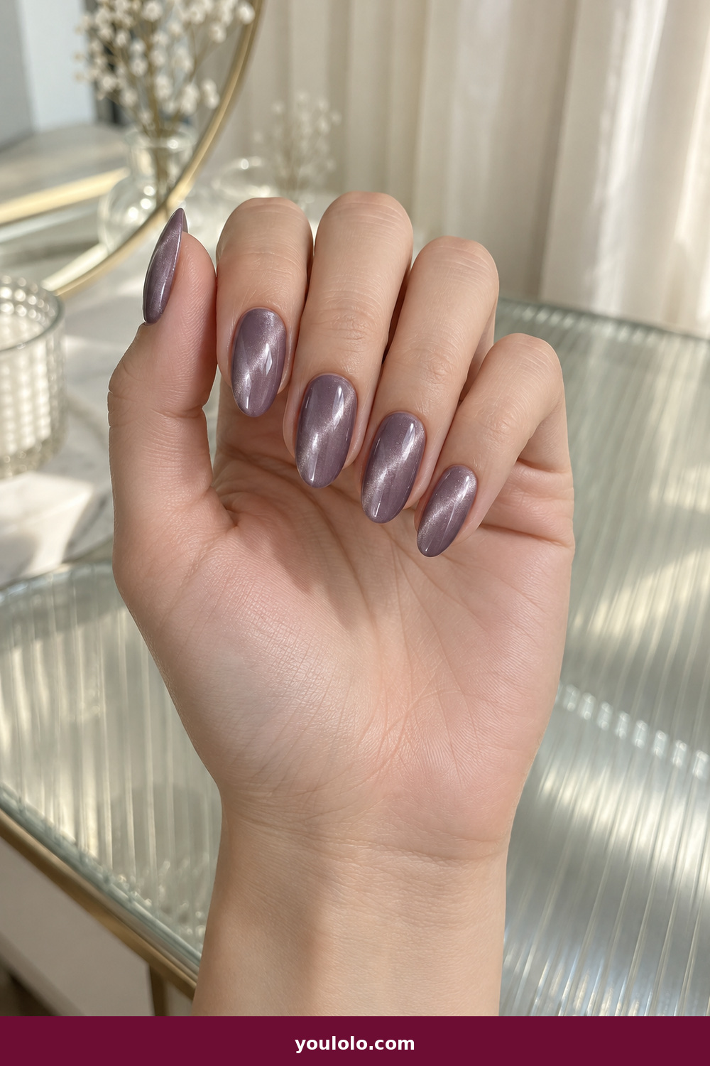 Gel Nails Ideas idea 5: Smoky Lilac Cat Eye, medium almond smoky lilac magnetic cat-eye gel with a narrow light beam
