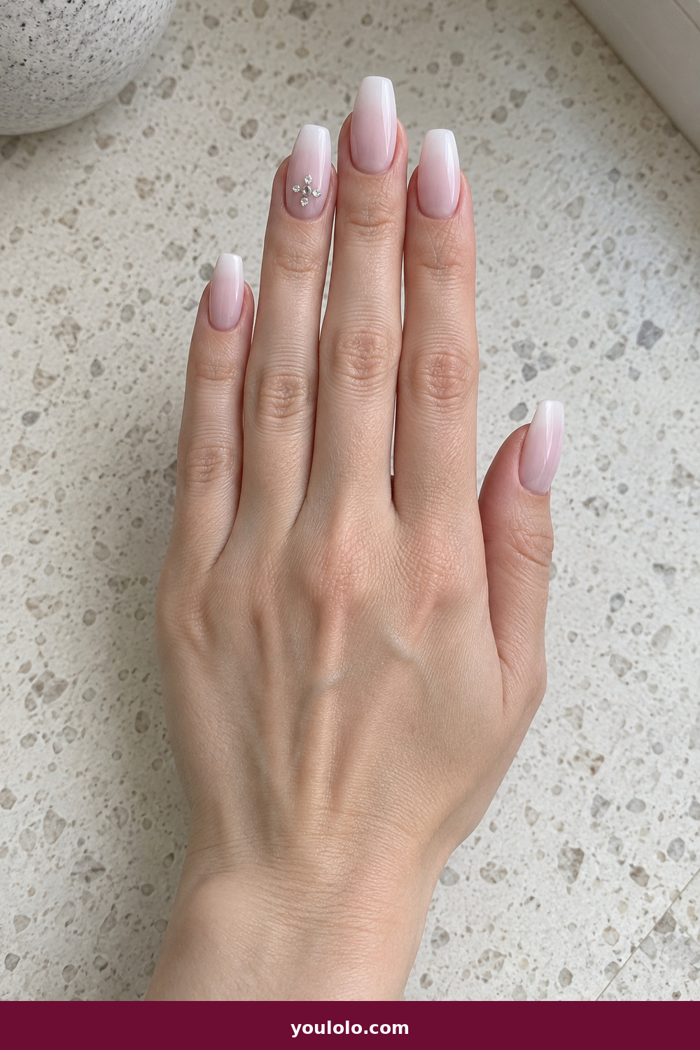 Pink Nails with Rhinestones on One Finger Ideas: Milky Pink Ombré Diamond, Milky white-to-ballet-pink coffin ombré with a miniature crystal diamond composition on the ring finger.
