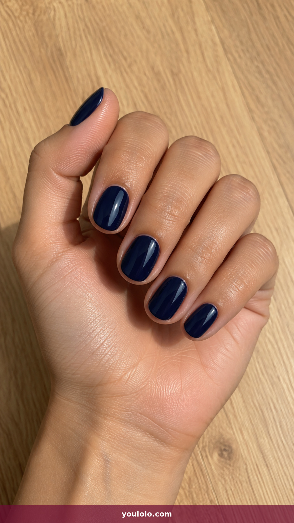 Short Oval Nails idea 6: Navy Ink Gloss in a realistic fall manicure