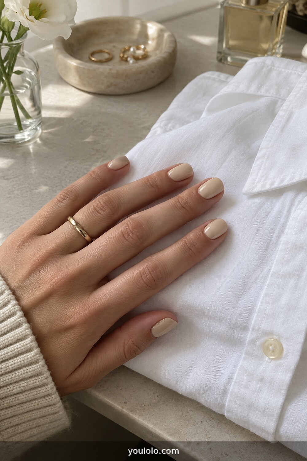 Creamy oat milk polish on short square nails