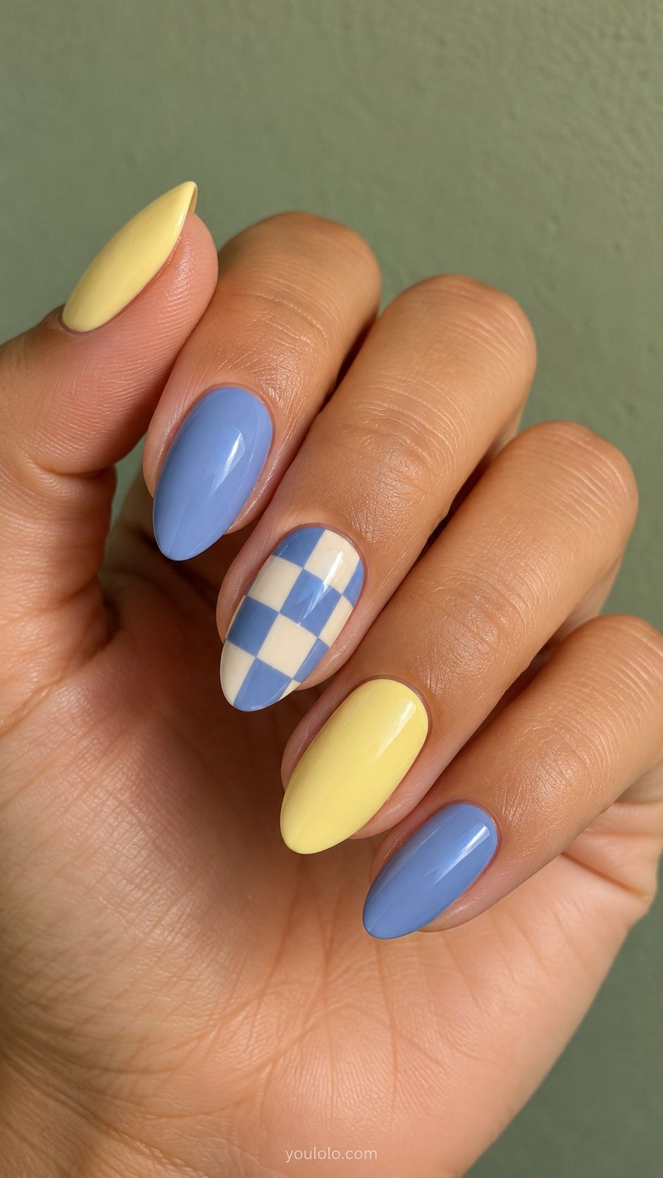 A pastel checkerboard accent manicure