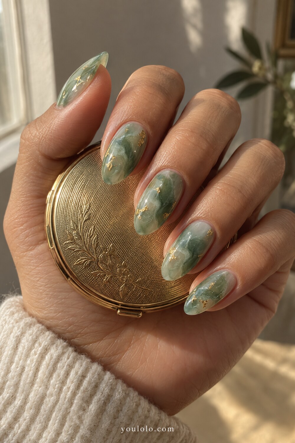 Classic medium jade green stone effect on almond nails