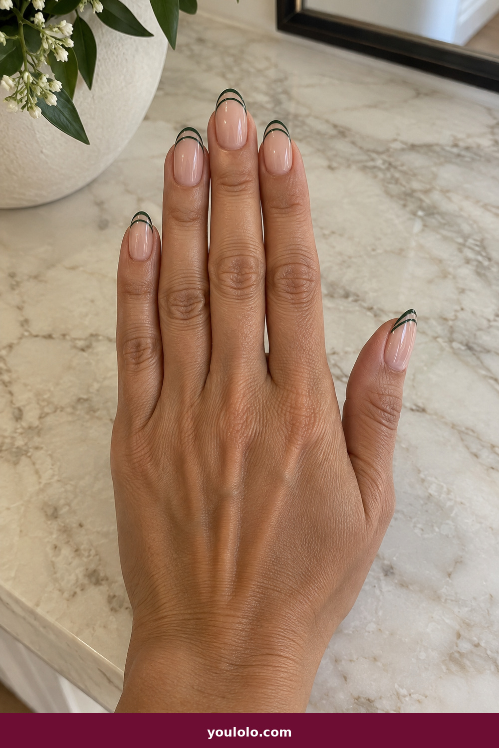 Elegant Almond Nails idea 7: Forest Double Tip, medium almond nude nails with two narrow forest-green French lines