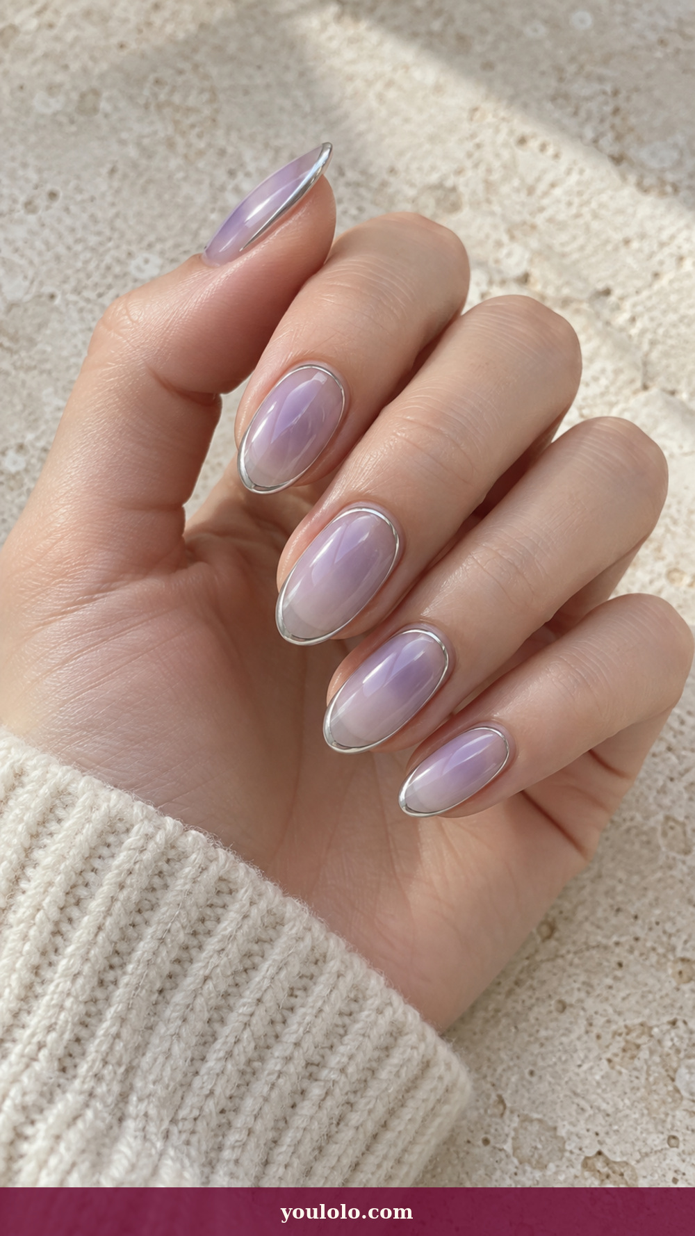 Douyin Nails idea 7: Icy Lilac Halo Frame on a realistic feminine hand