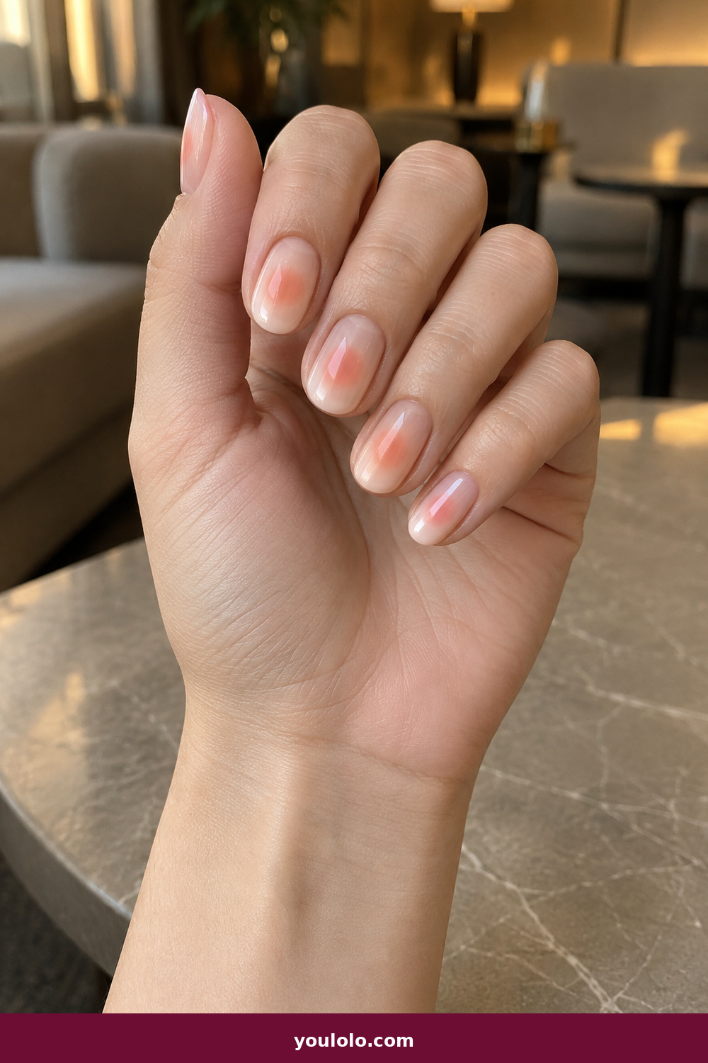Short Nails Inspo idea 7: Peach Aura, short oval nails with a soft peach aura center on a pale base