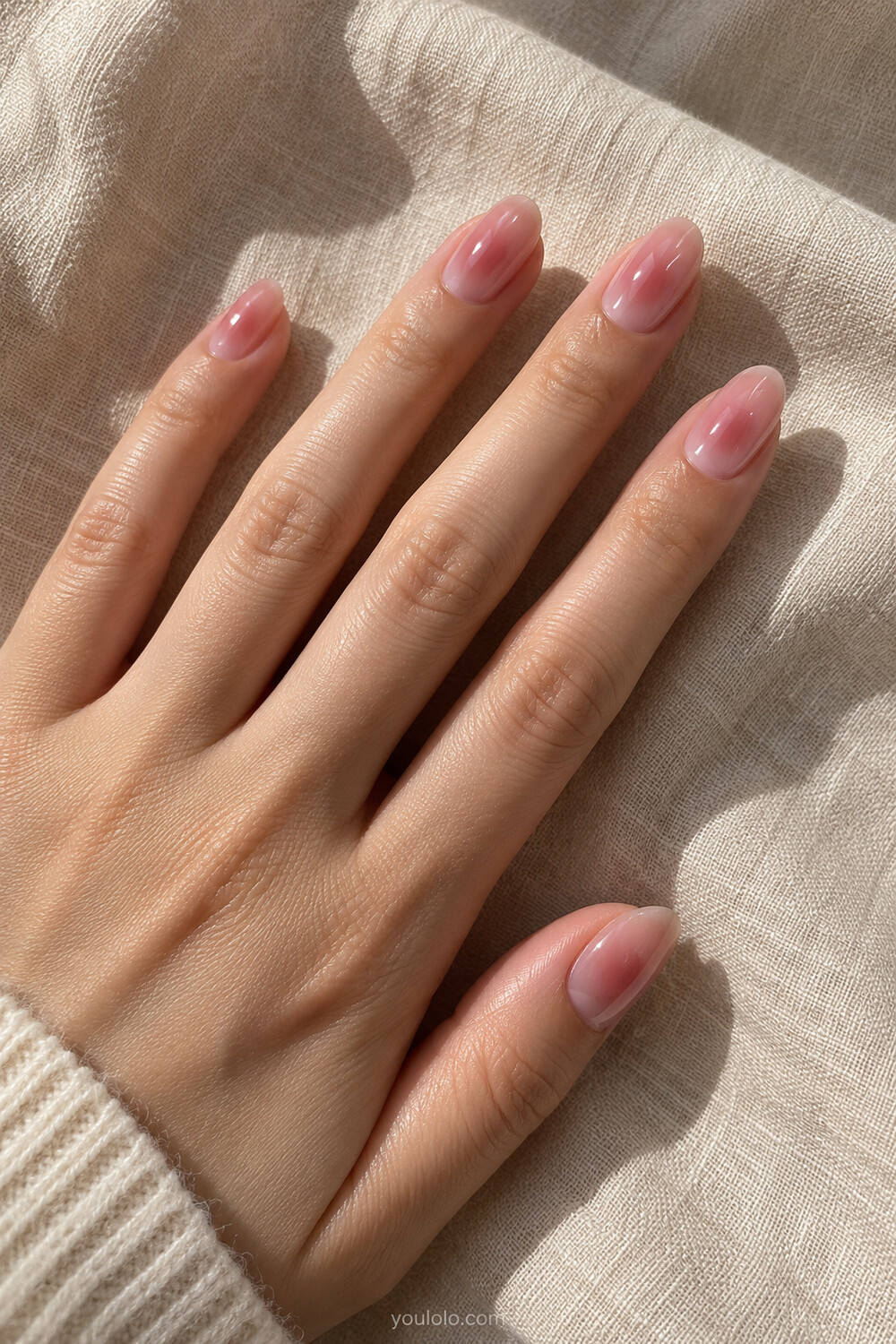Pink blush Korean syrup manicure with diffused rosy centers