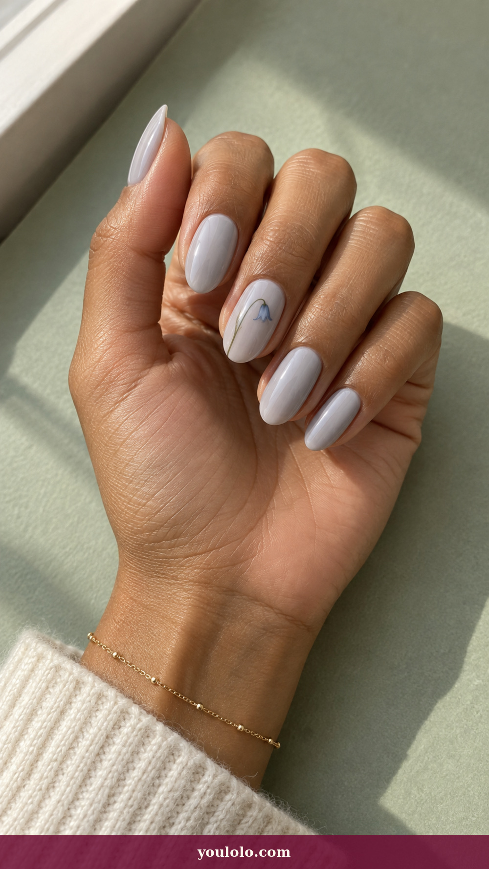 Simple Spring Nails idea 8: Bluebell Stem on a realistic feminine hand