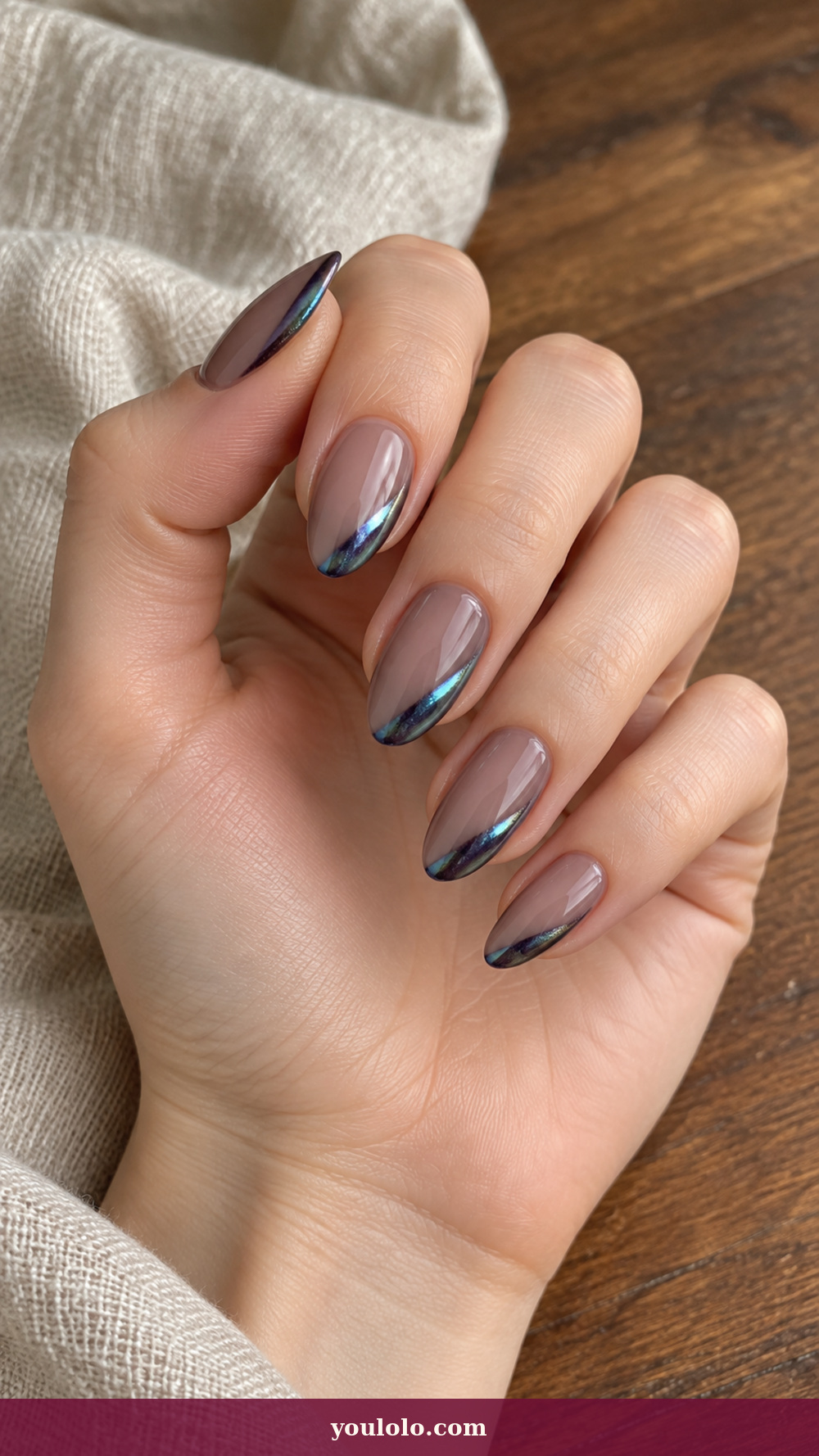 Short Stiletto Nails idea 8: Petrol Oil-Slick Edge on a realistic feminine hand