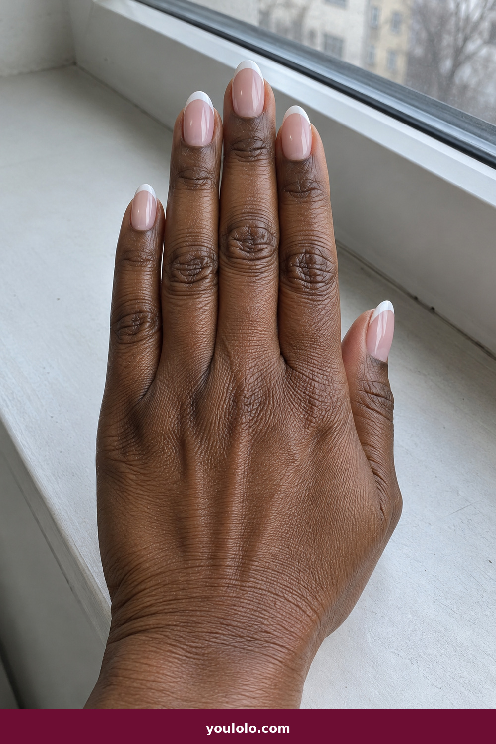 Pink and White Nails idea 8: Pink Pearl French, medium almond pearl-pink base with creamy white French tips