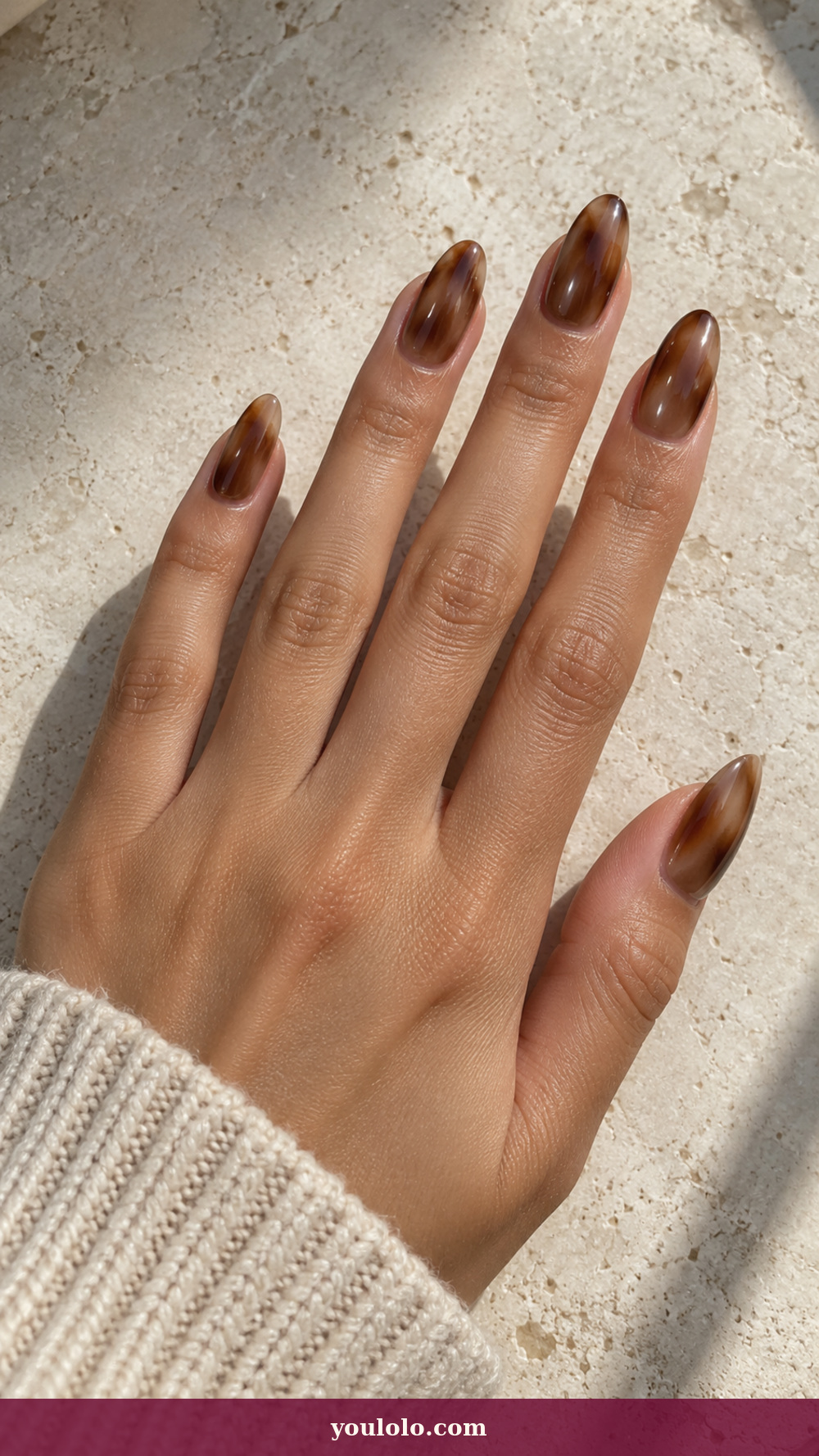 Acrylic Nails Ideas idea 8: Polished Horn Gradient on a realistic feminine hand