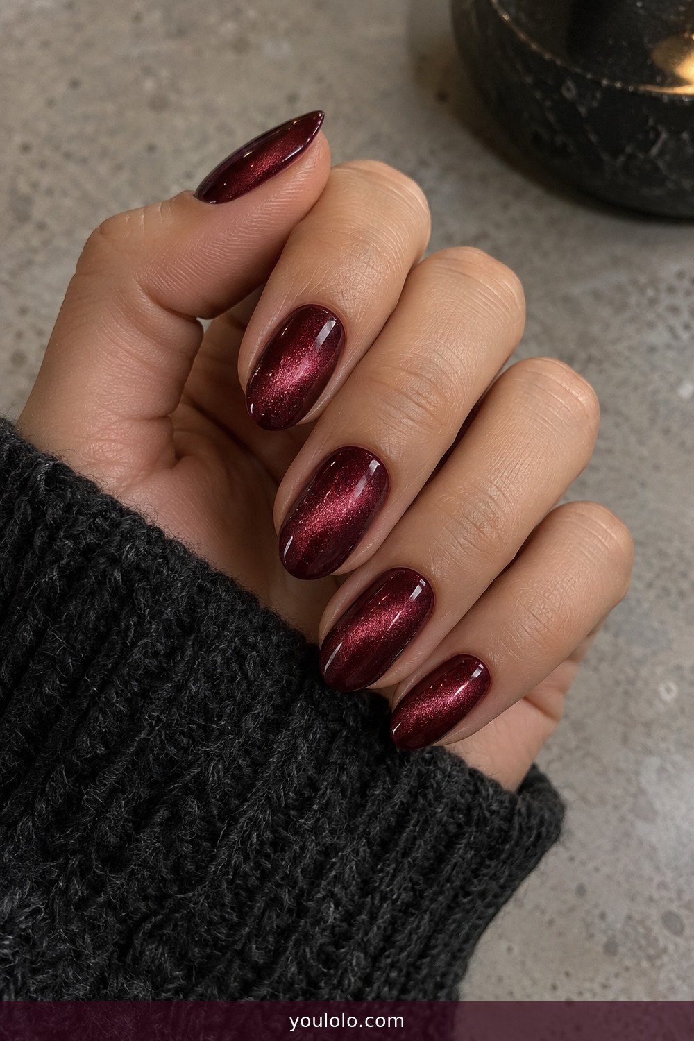 Deep raspberry velvet cat eye oval manicure