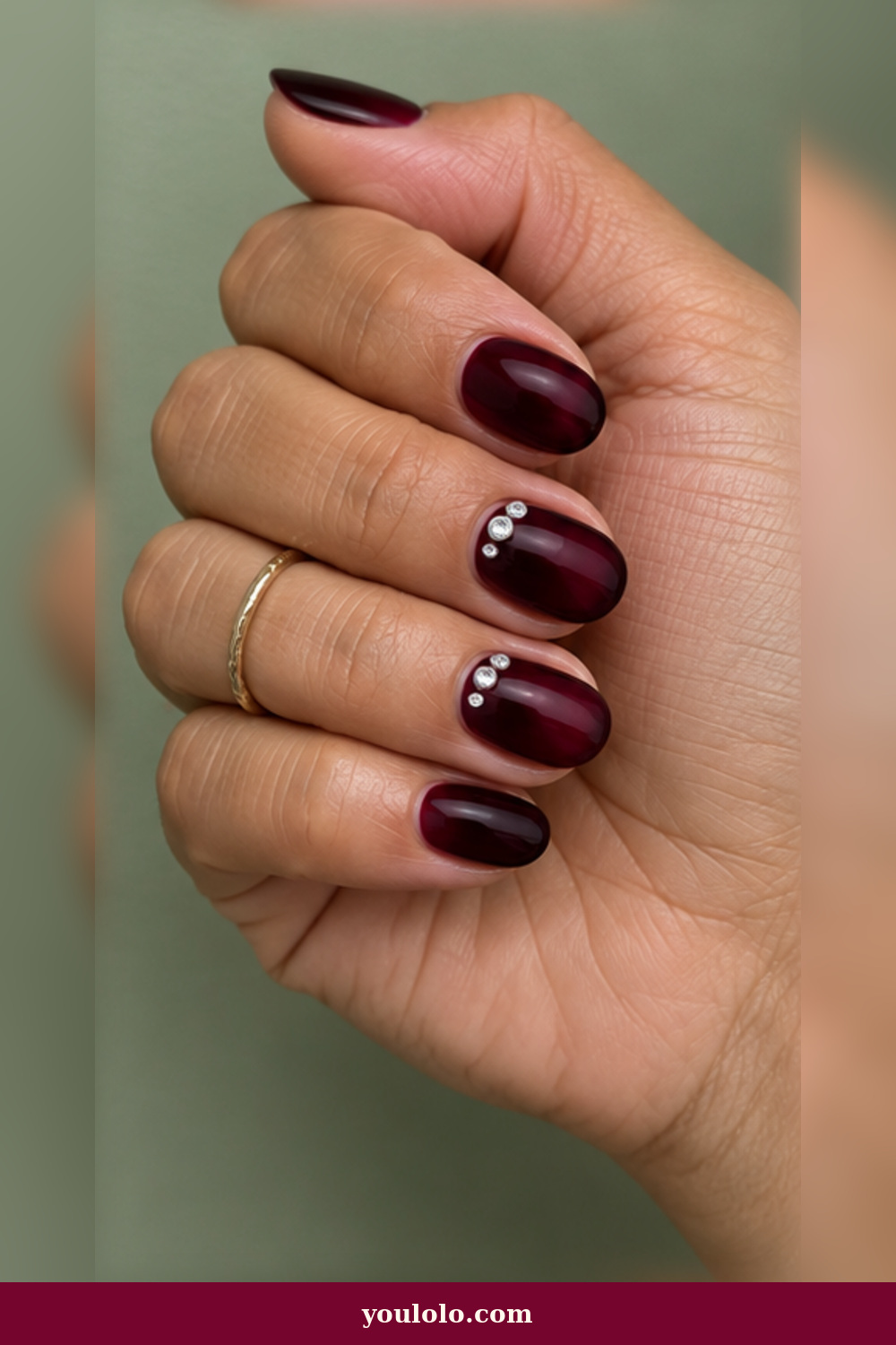 Festival Nails idea 9: black cherry manicure with cuticle gems